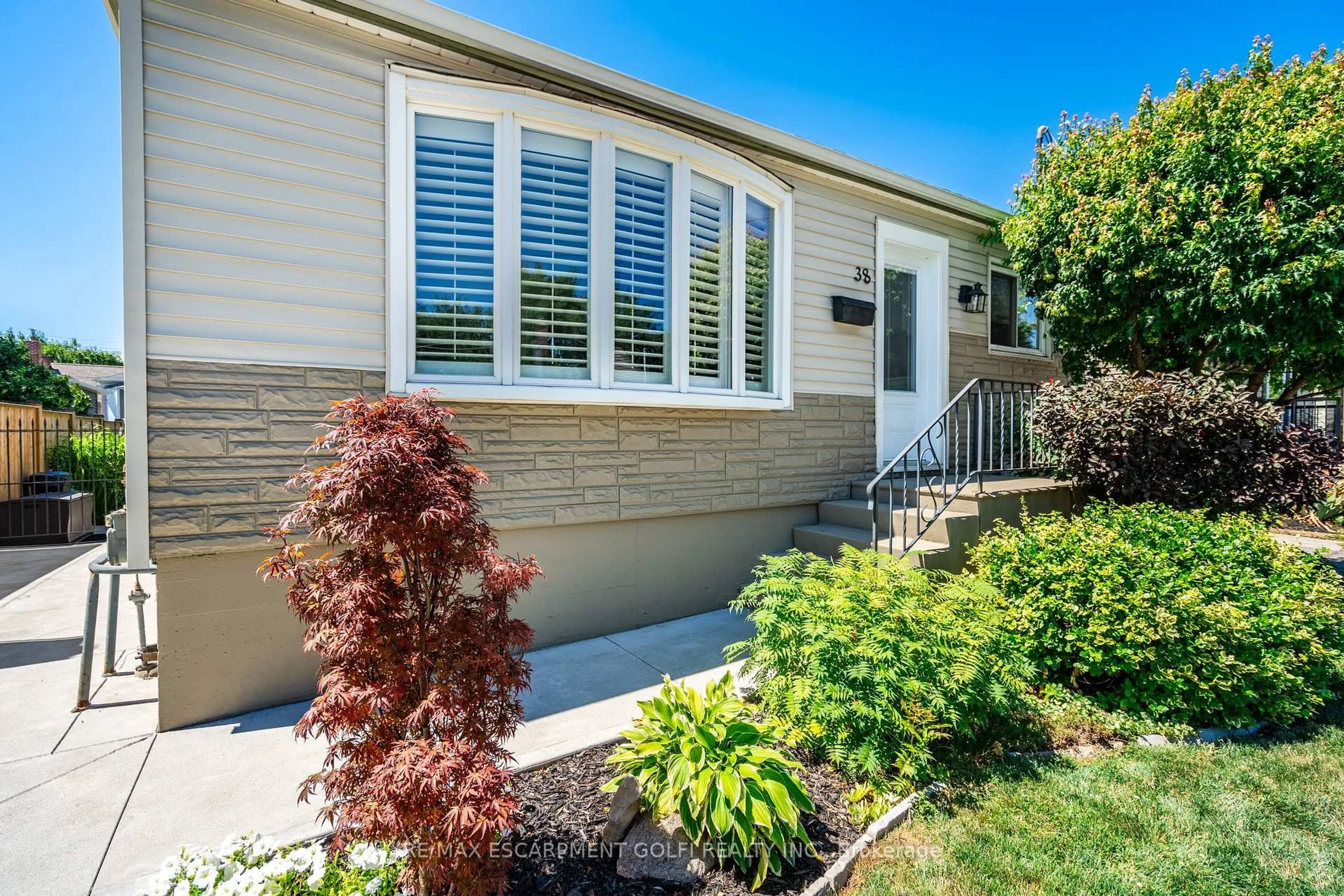 Home with vinyl exterior material, street for 38 Salem Ave, Hamilton Ontario L9A 3V9