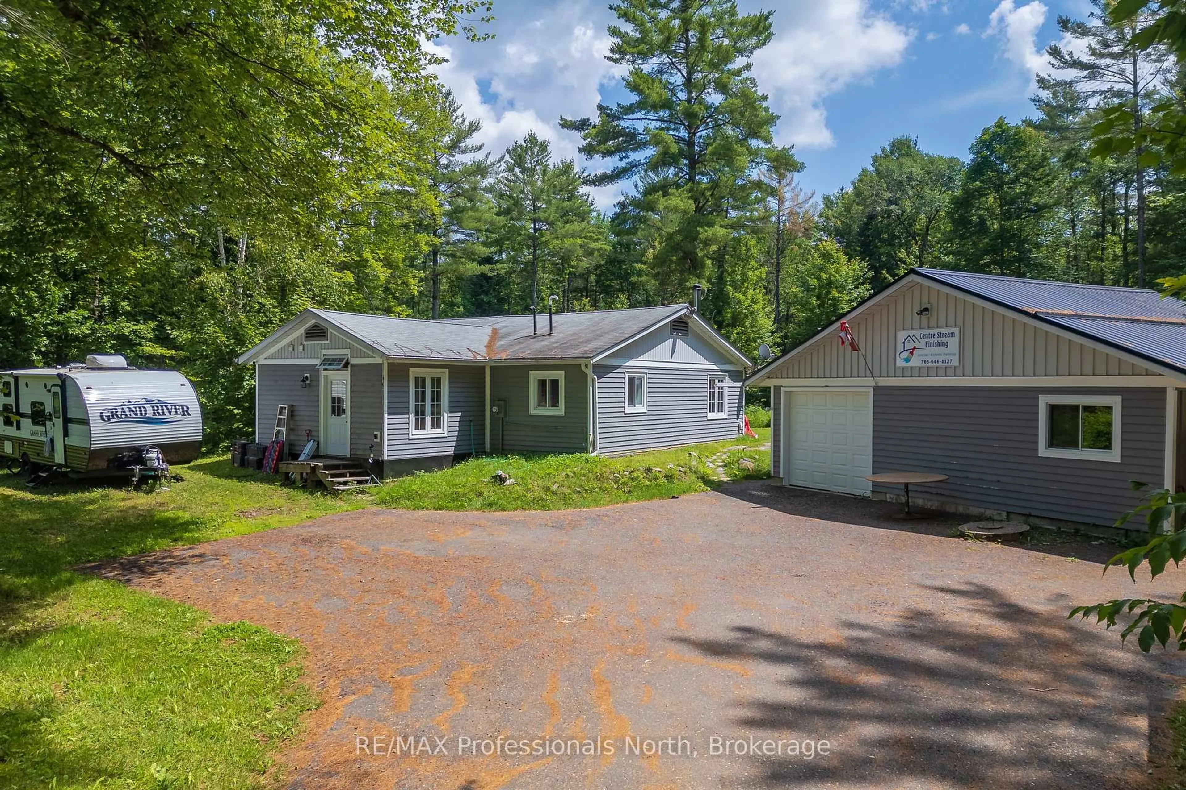 A pic from outside/outdoor area/front of a property/back of a property/a pic from drone, street for 187 Stephenson 4 Rd, Huntsville Ontario P0B 1M0