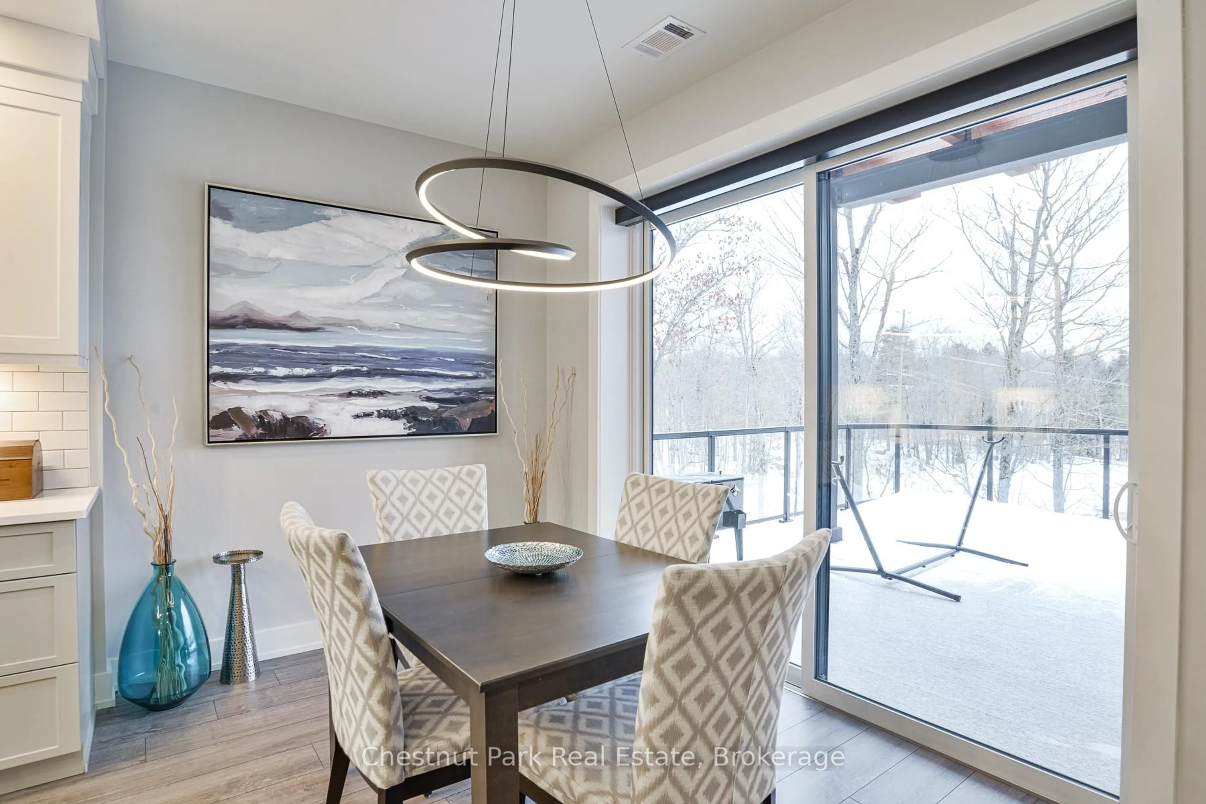 Dining room, wood/laminate floor for 18 Campus Tr #404, Huntsville Ontario P1H 0K2