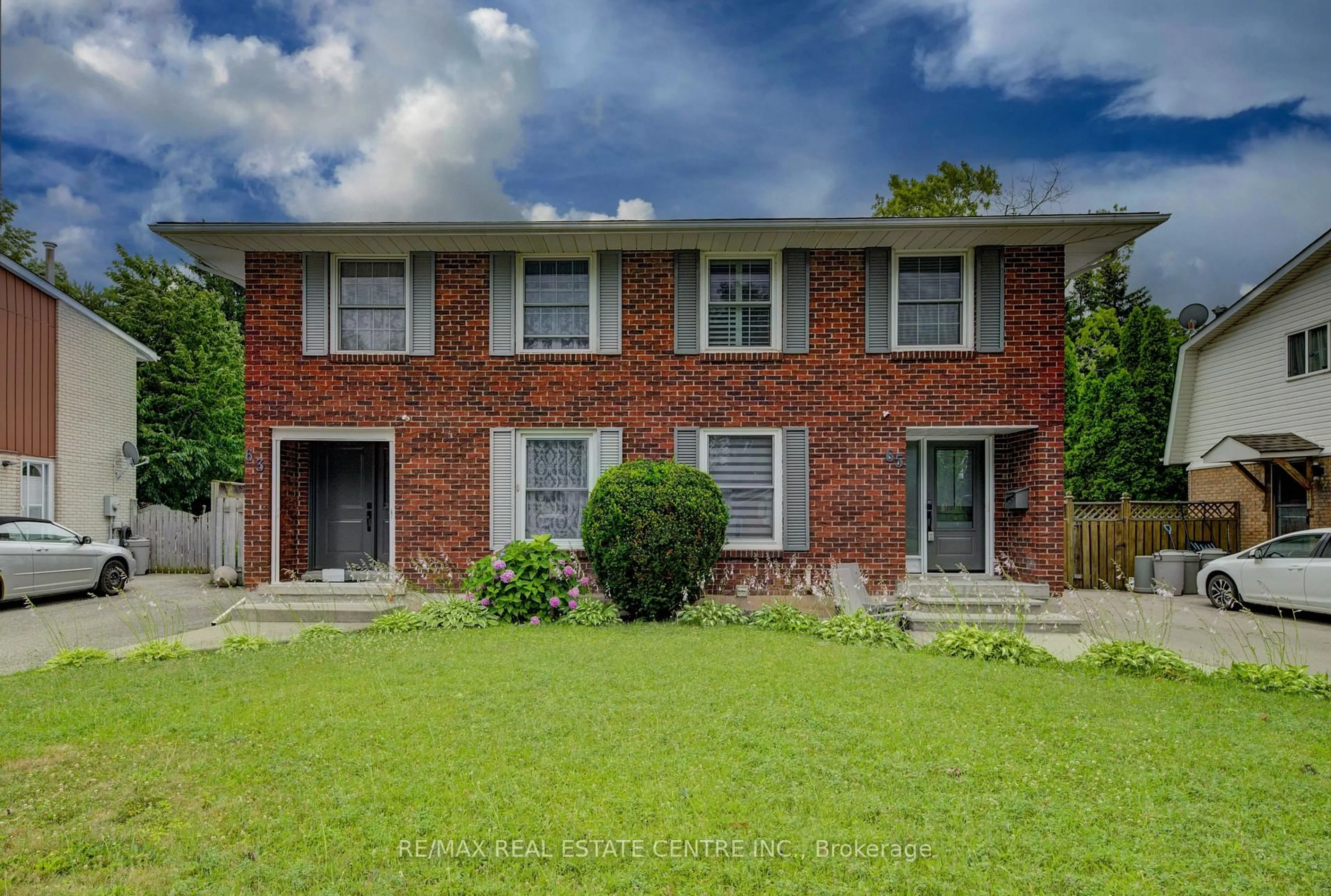 Home with brick exterior material, street for 65 Selkirk Dr, Kitchener Ontario N2E 1M5