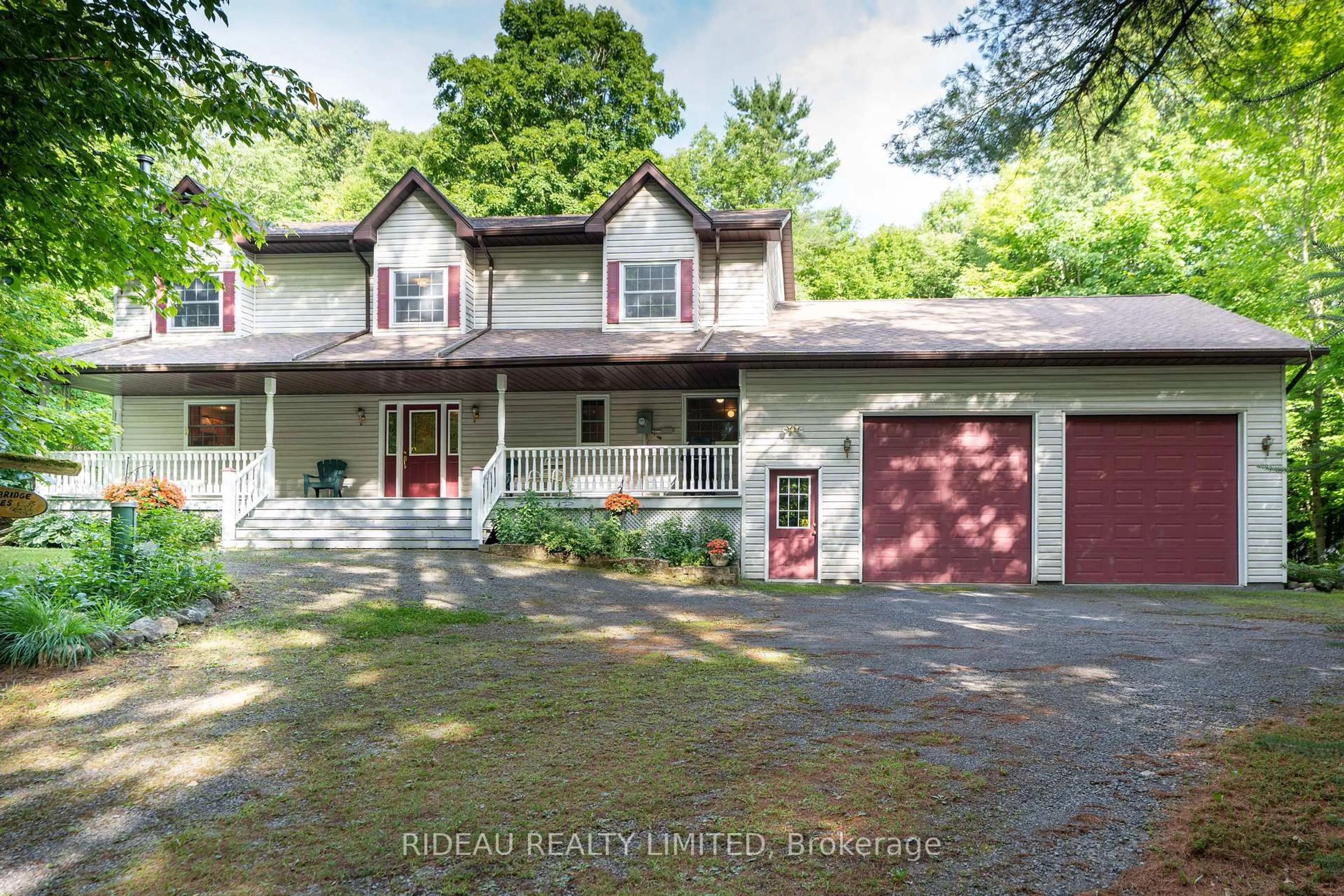 A pic from outside/outdoor area/front of a property/back of a property/a pic from drone, street for 8652 Perth Rd, Rideau Lakes Ontario K0G 1X0