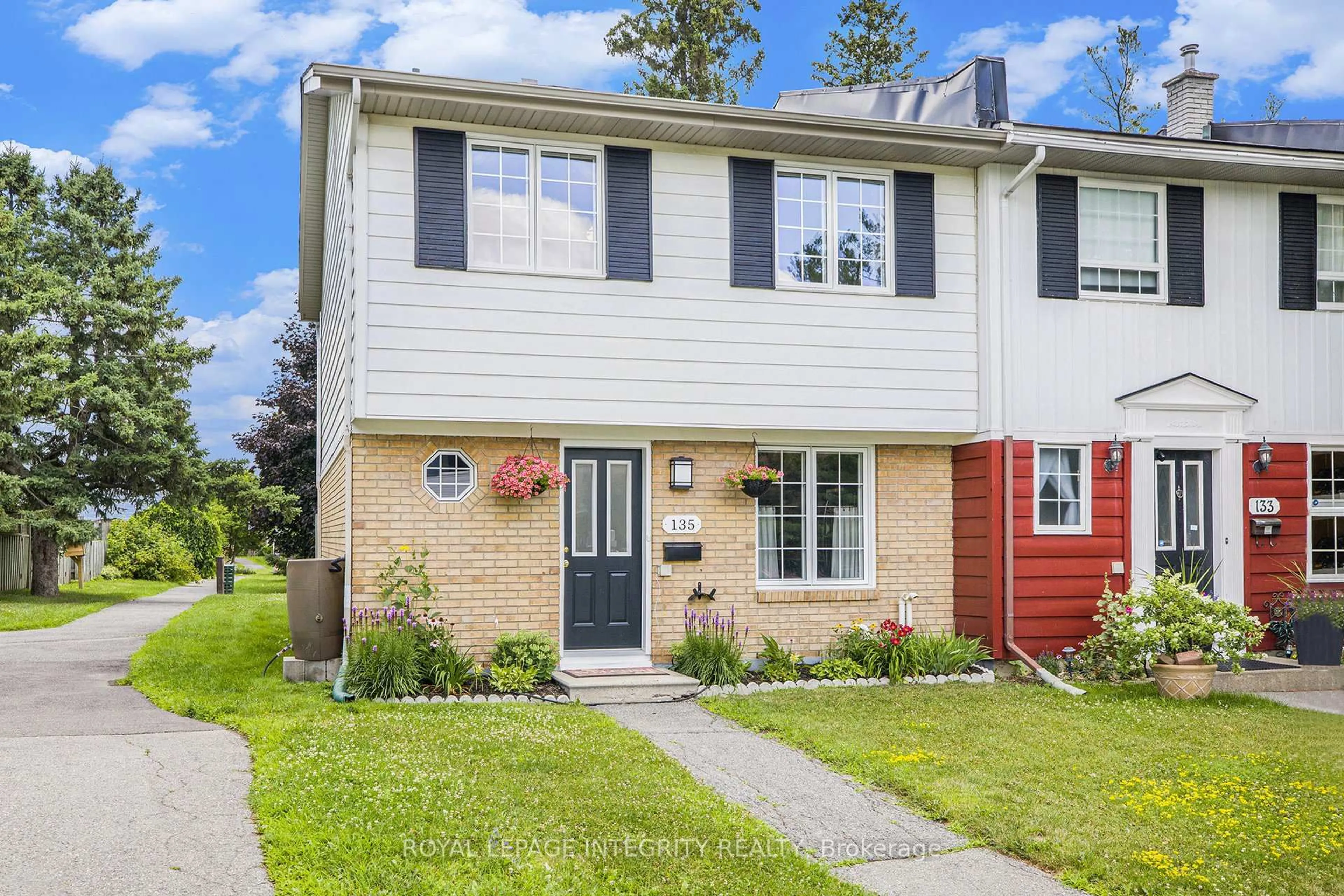 Home with vinyl exterior material, street for 135 Monterey Dr, Ottawa Ontario K2H 7A9