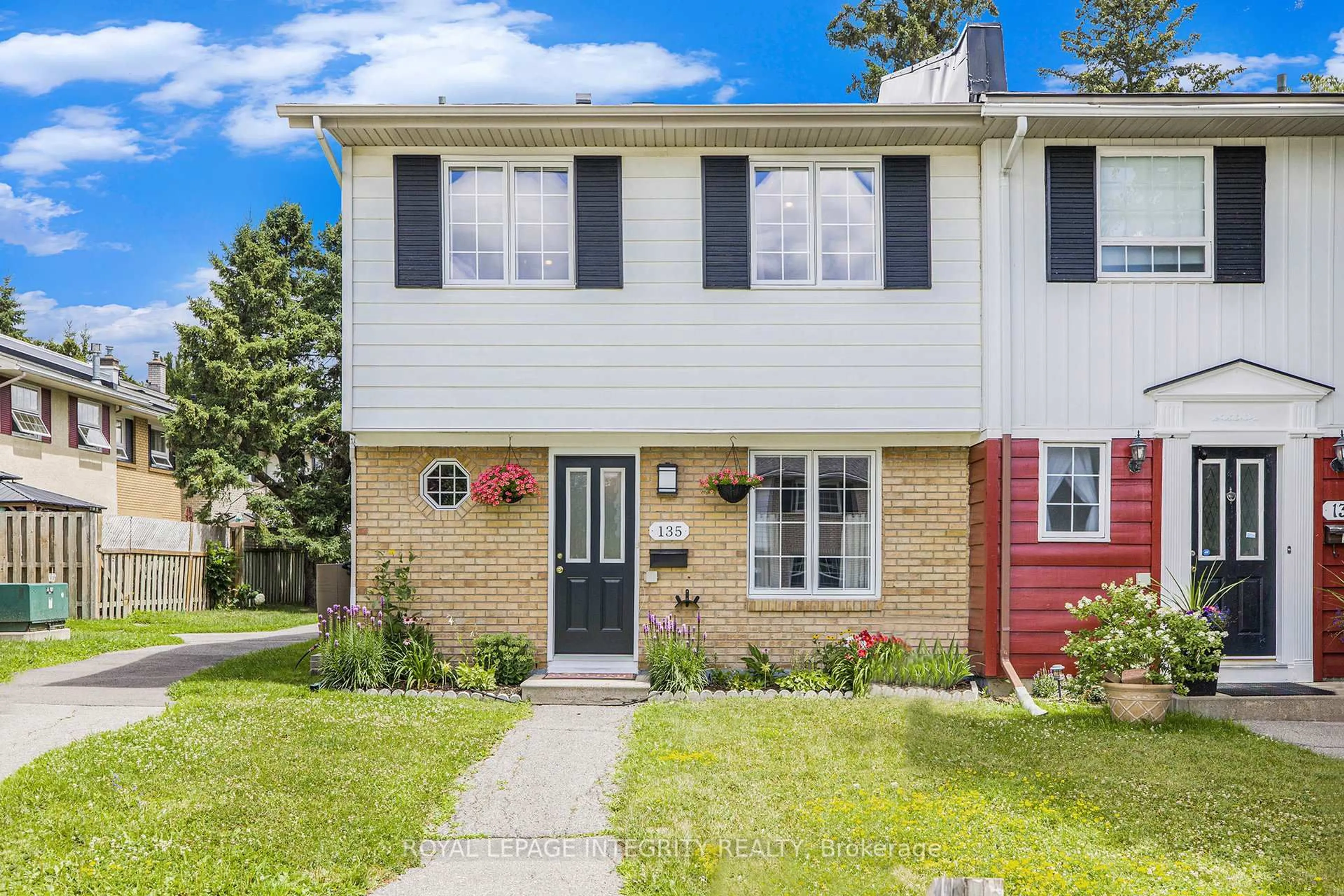 Home with vinyl exterior material, street for 135 Monterey Dr, Ottawa Ontario K2H 7A9