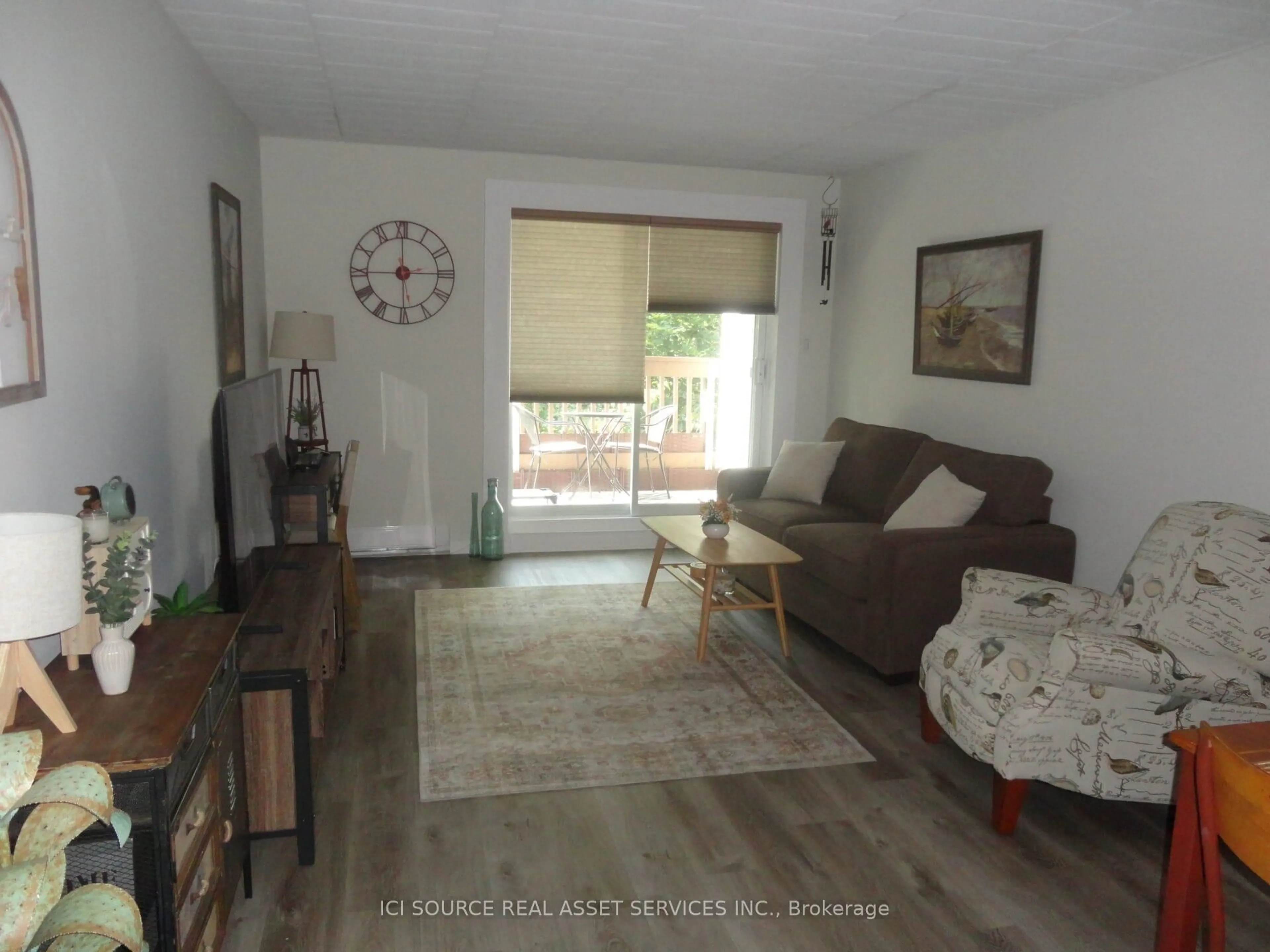 Living room with furniture, unknown for 213 Leonard St #202, North Bay Ontario P1B 5K3