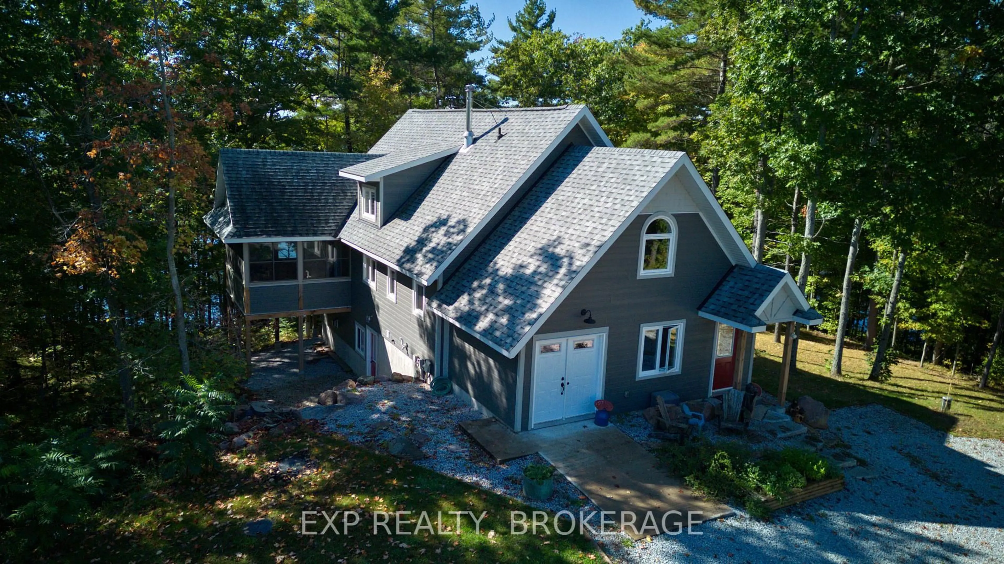 A pic from outside/outdoor area/front of a property/back of a property/a pic from drone, unknown for 1506 Williams Lane, Sharbot Lake Ontario K0H 2P0