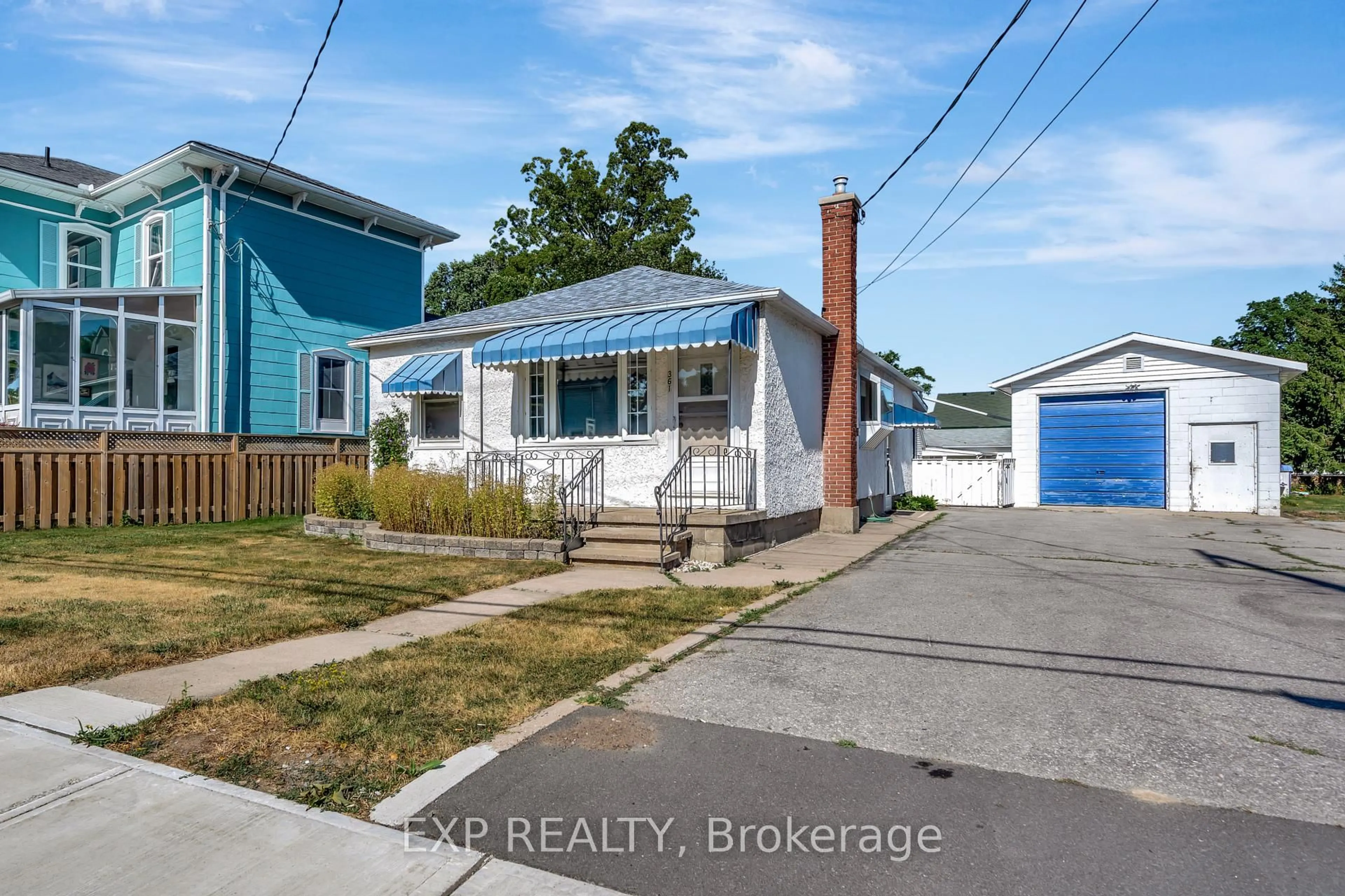 A pic from outside/outdoor area/front of a property/back of a property/a pic from drone, street for 361 Picton Main St, Prince Edward County Ontario K0K 2T0