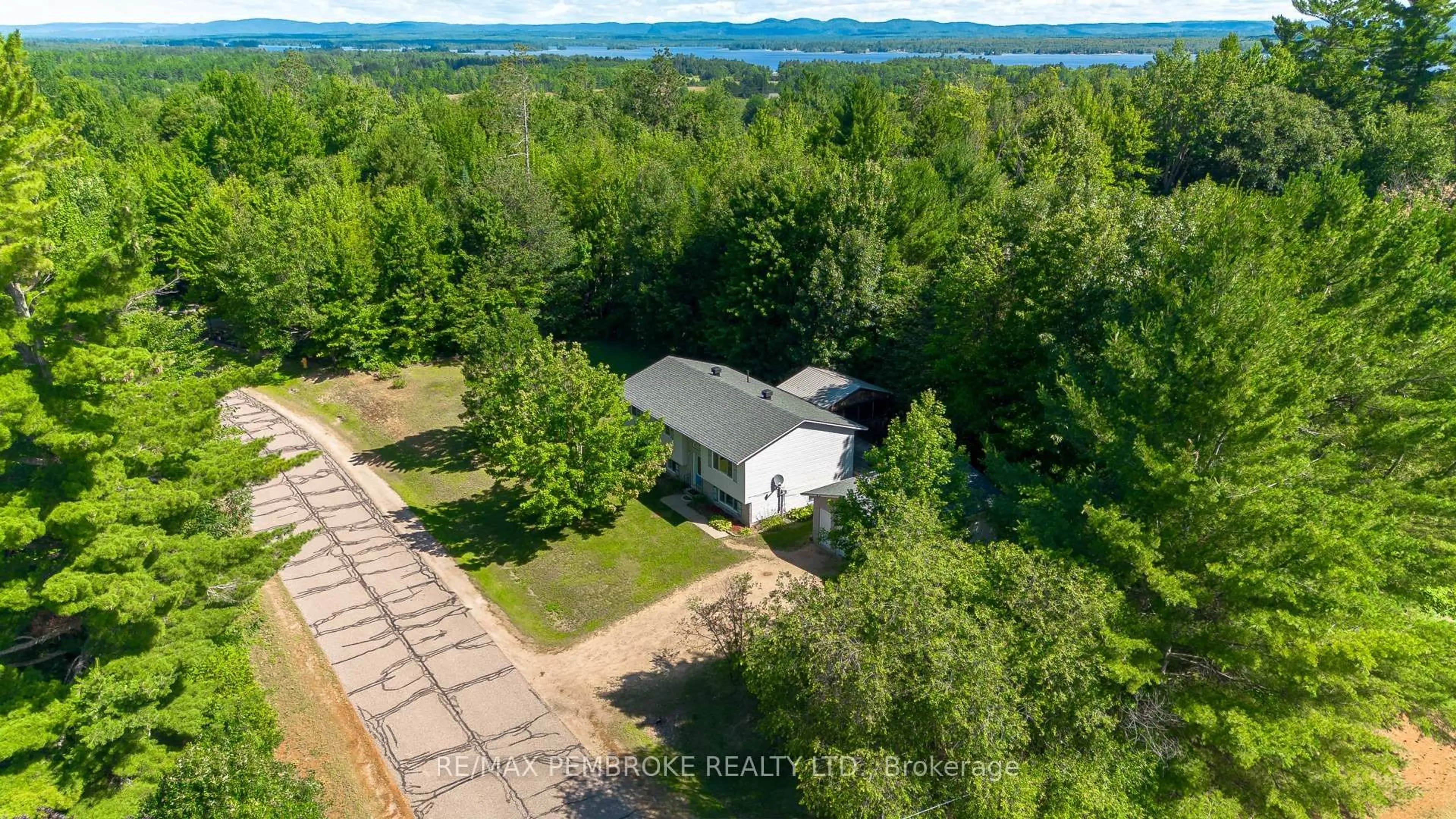 A pic from outside/outdoor area/front of a property/back of a property/a pic from drone, water/lake/river/ocean view for 2 Runge Dr, Petawawa Ontario K8A 8P3