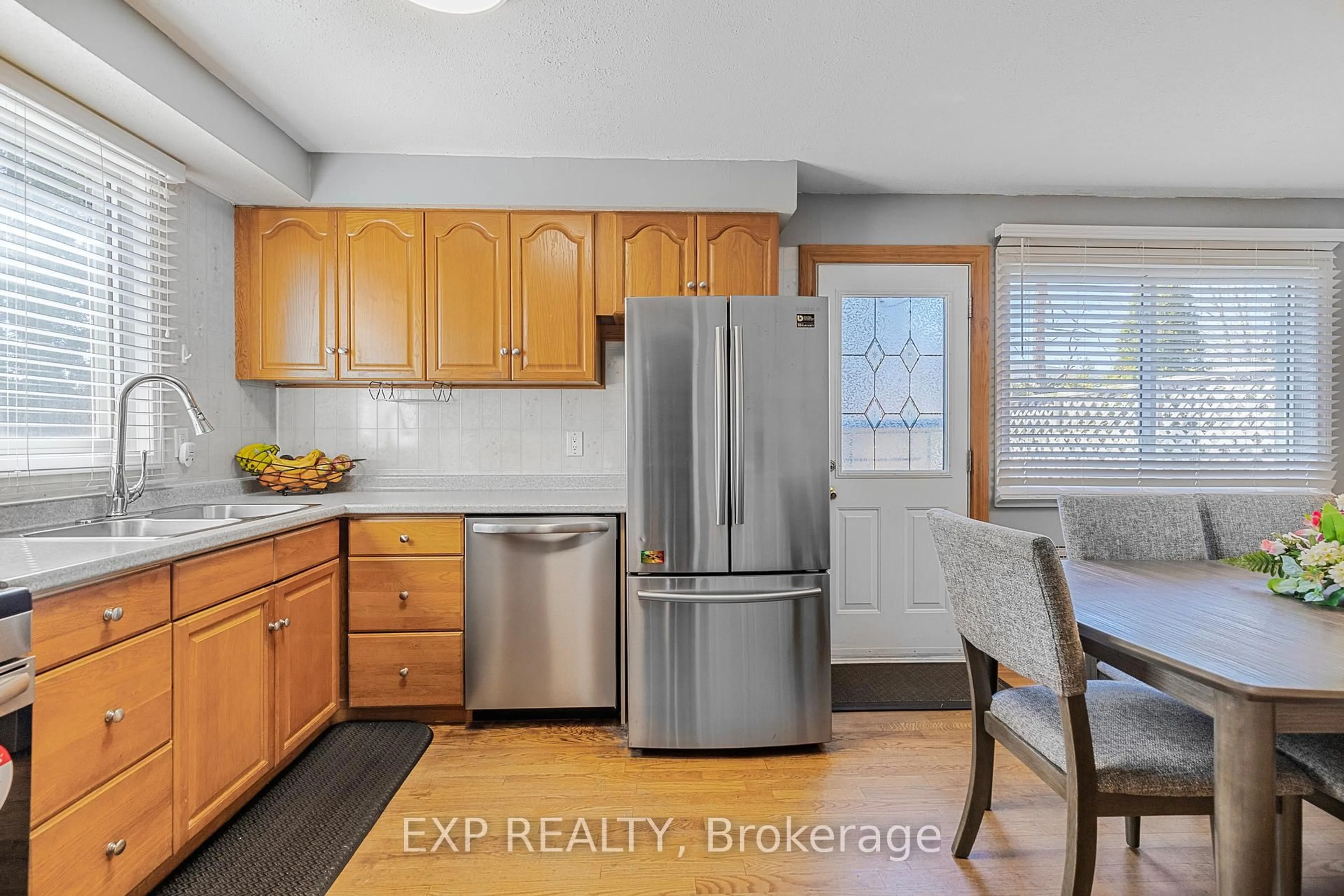 Standard kitchen, wood/laminate floor for 294 Quigley Rd, Hamilton Ontario L8K 5N1
