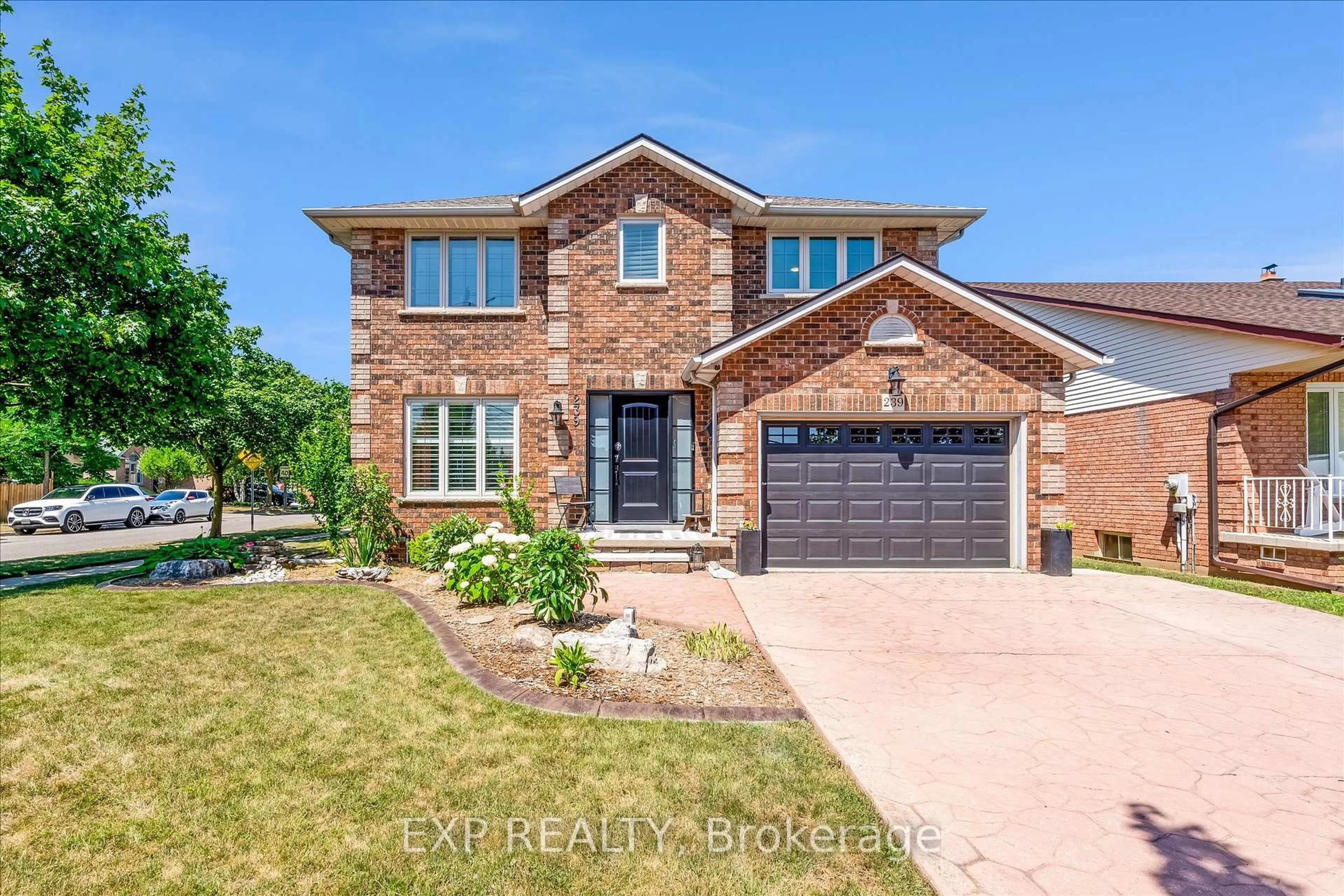 Home with brick exterior material, street for 239 Fruitland Rd, Hamilton Ontario L8E 5J8