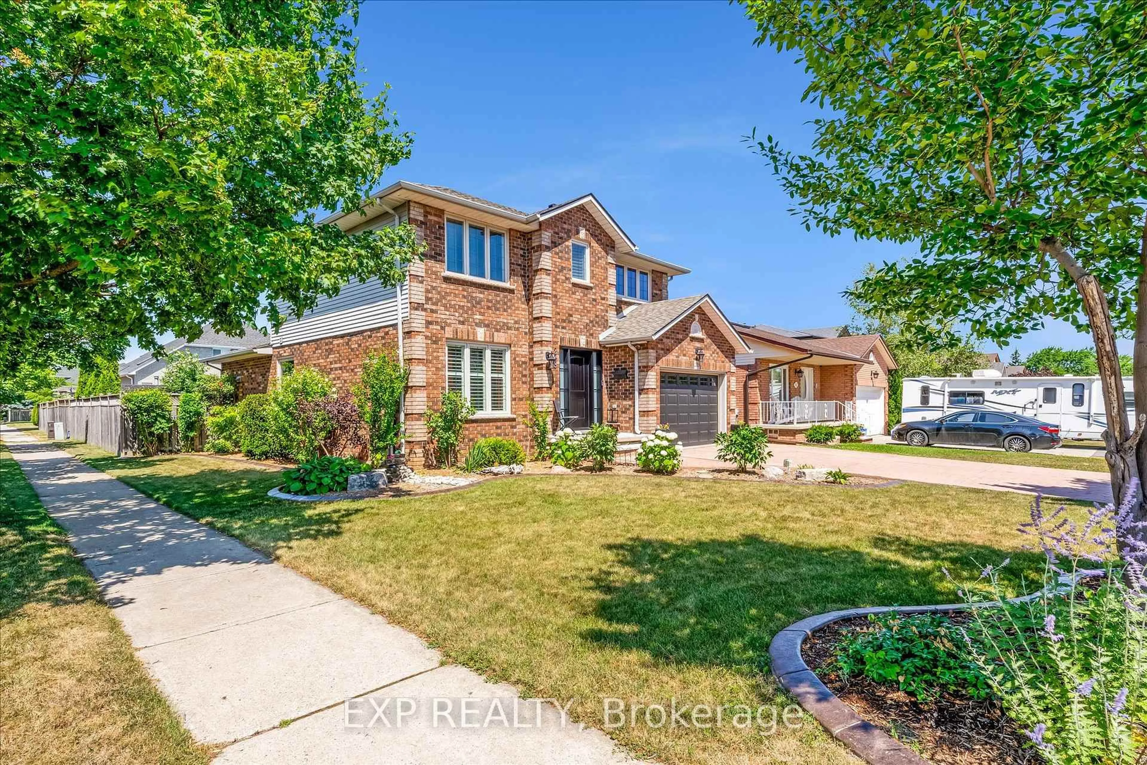 Home with brick exterior material, street for 239 Fruitland Rd, Hamilton Ontario L8E 5J8