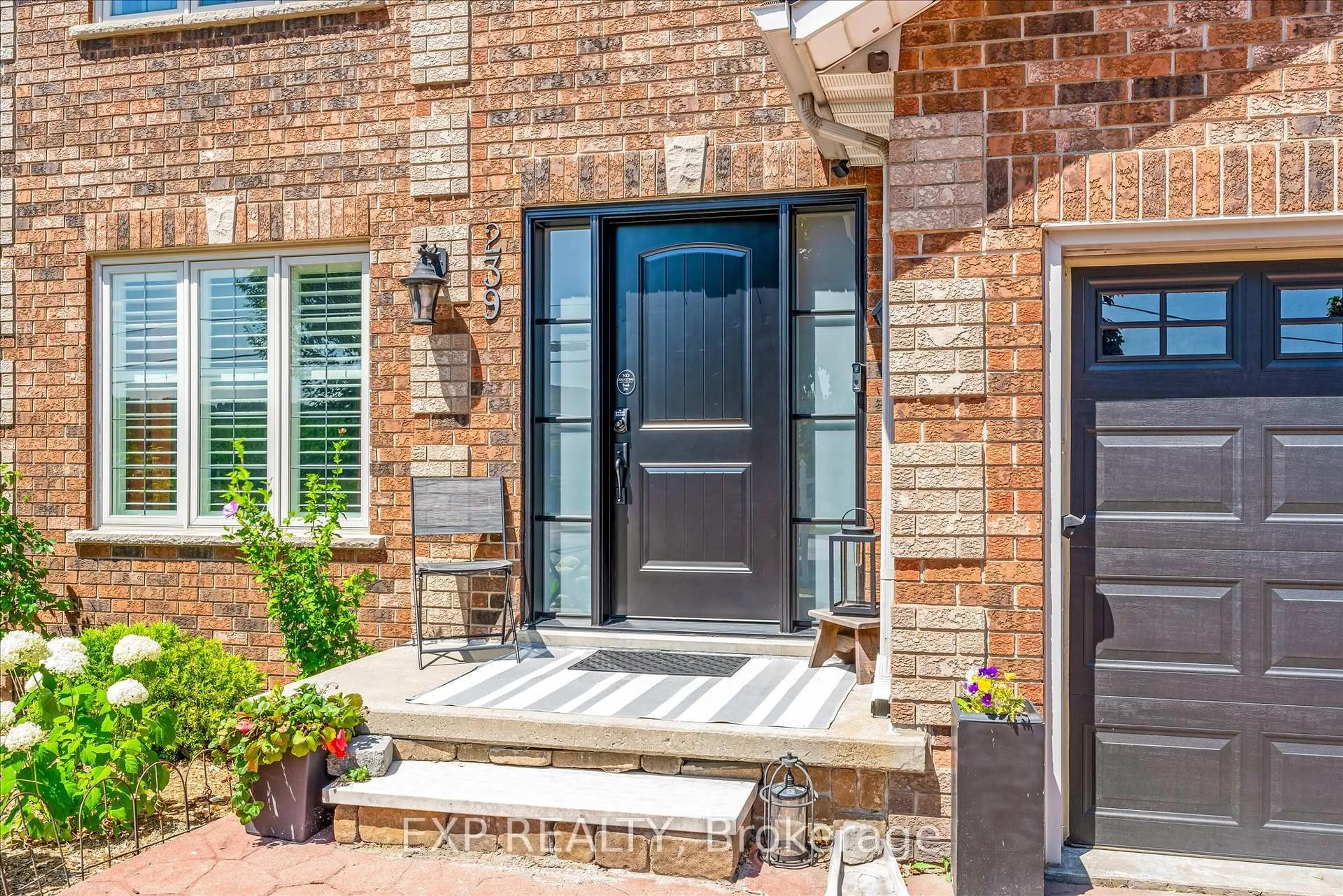 Home with brick exterior material, street for 239 Fruitland Rd, Hamilton Ontario L8E 5J8