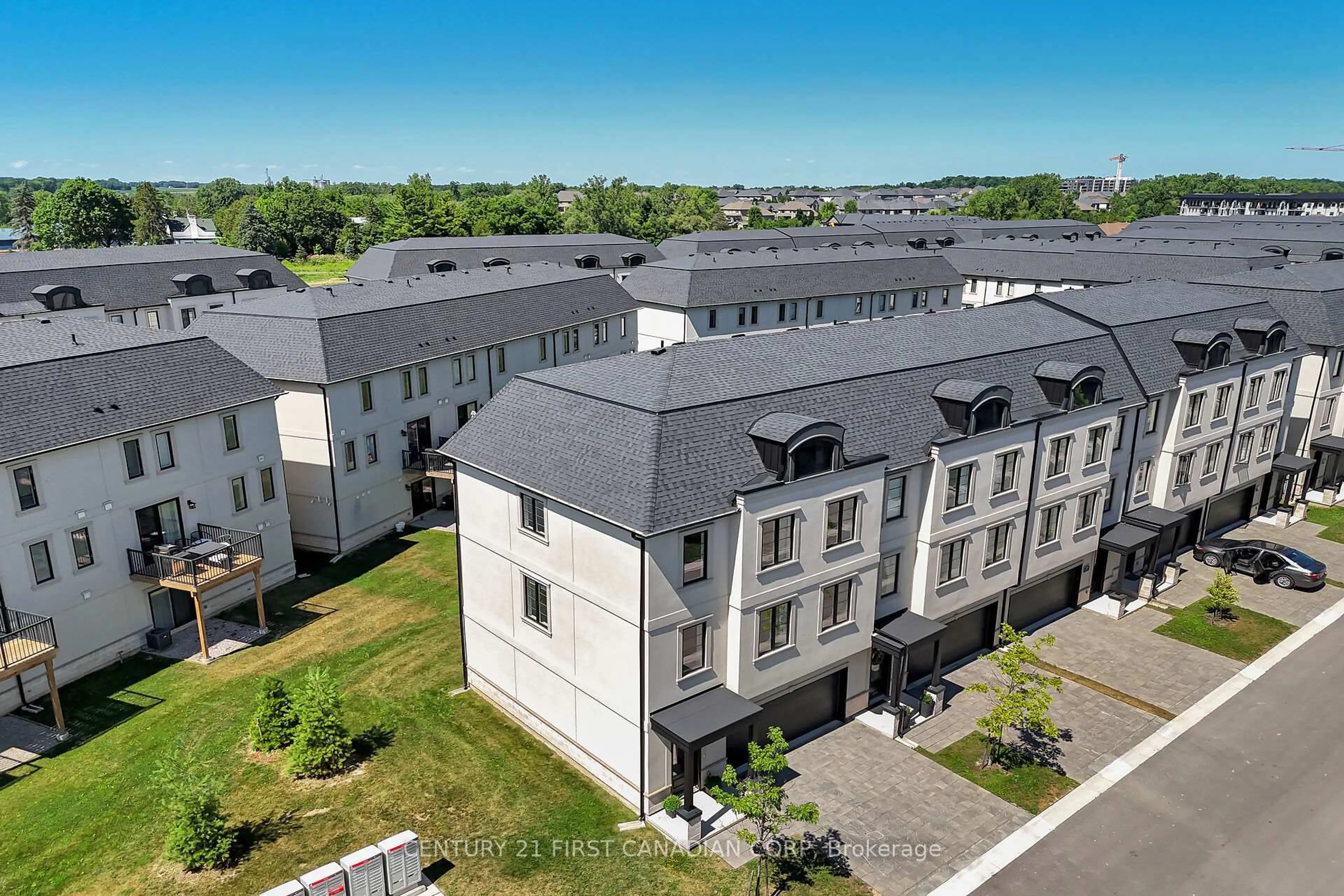 A pic from outside/outdoor area/front of a property/back of a property/a pic from drone, unknown for 435 Callaway Rd #81, London North Ontario N6G 2N1