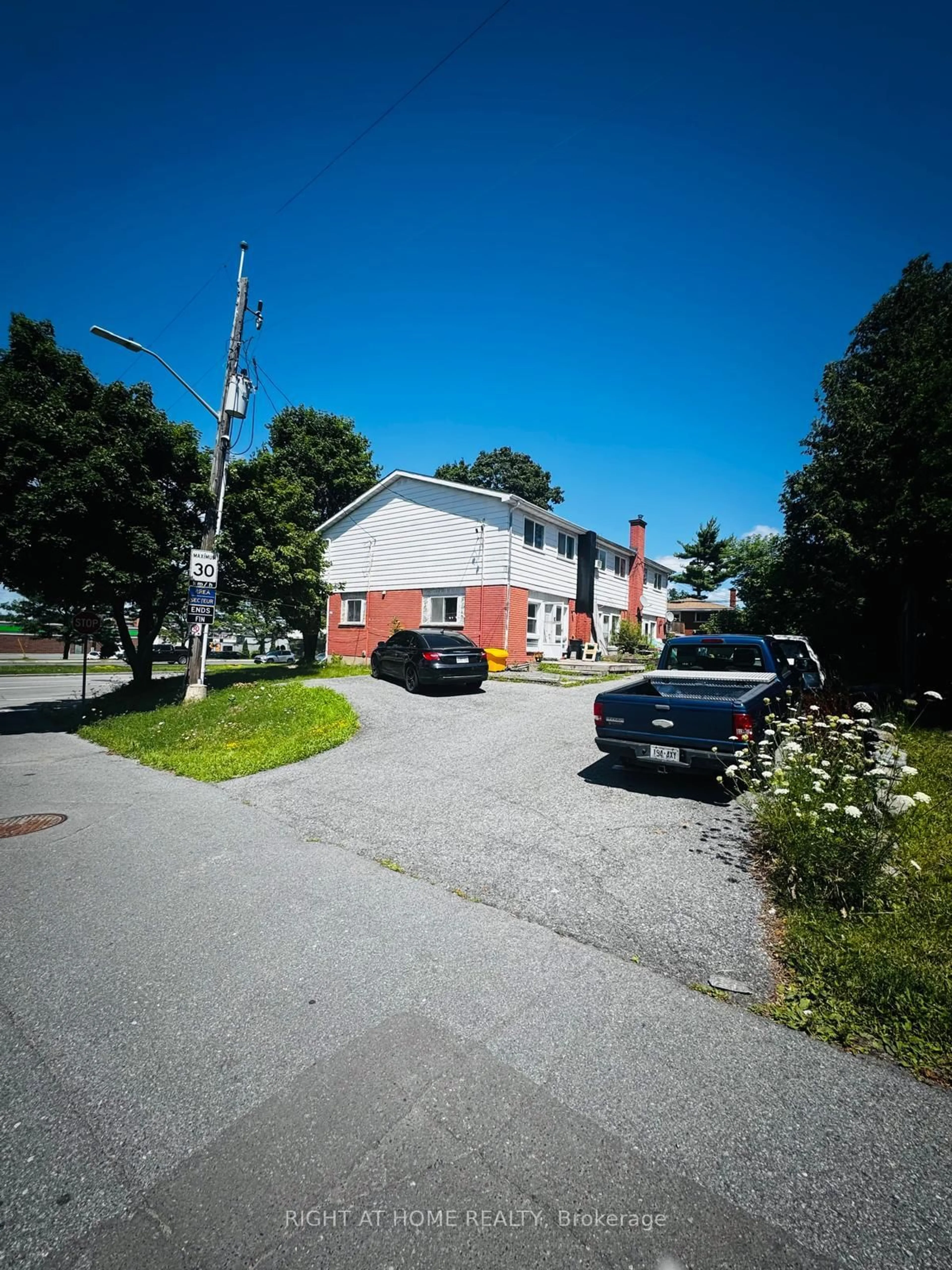 A pic from outside/outdoor area/front of a property/back of a property/a pic from drone, street for 2636,2638,2640 Carling Ave, Ottawa Ontario K2B 7H9