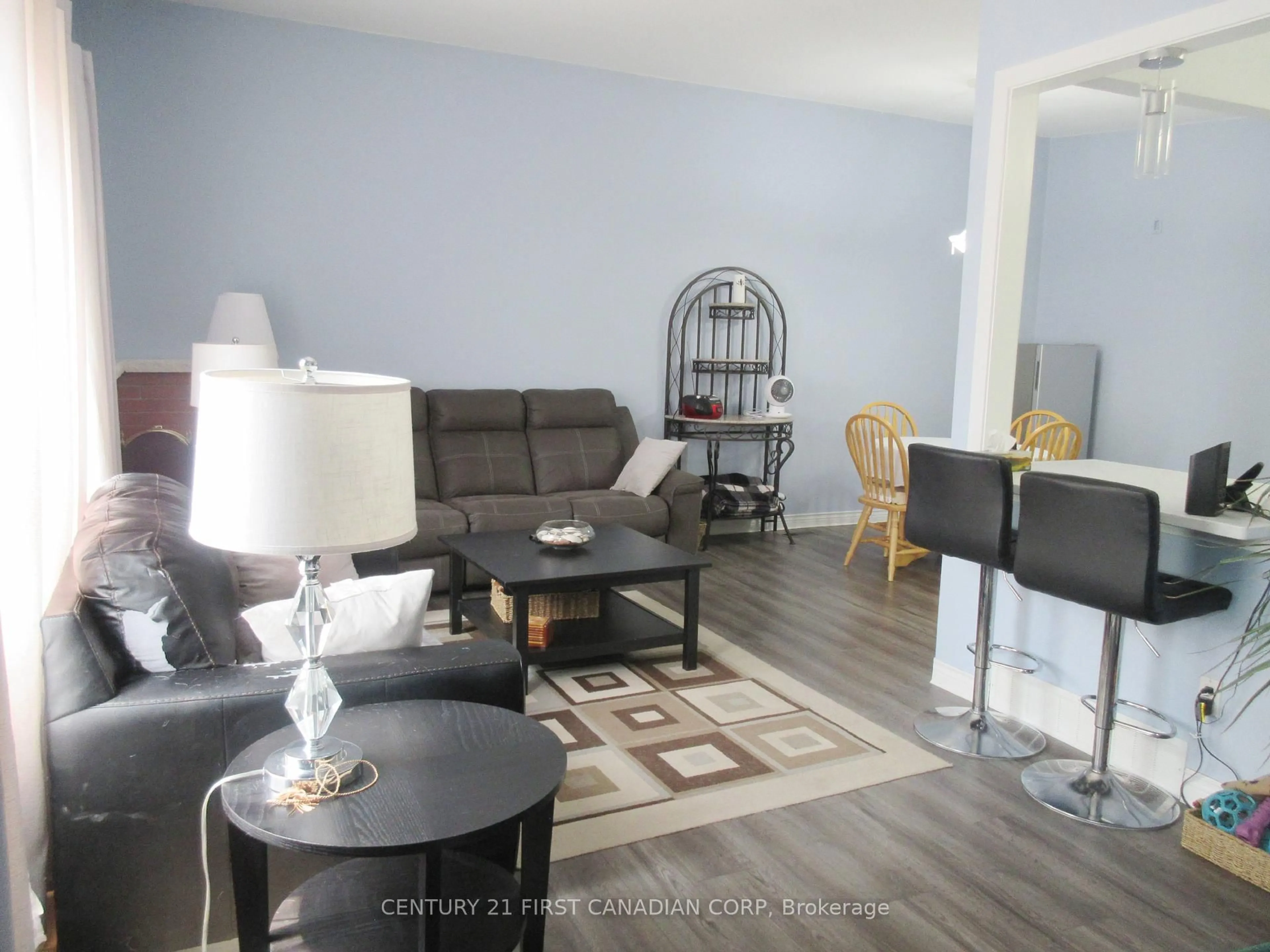 Living room with furniture, wood/laminate floor for 28 Hawkesbury Ave, London East Ontario N5V 2K1