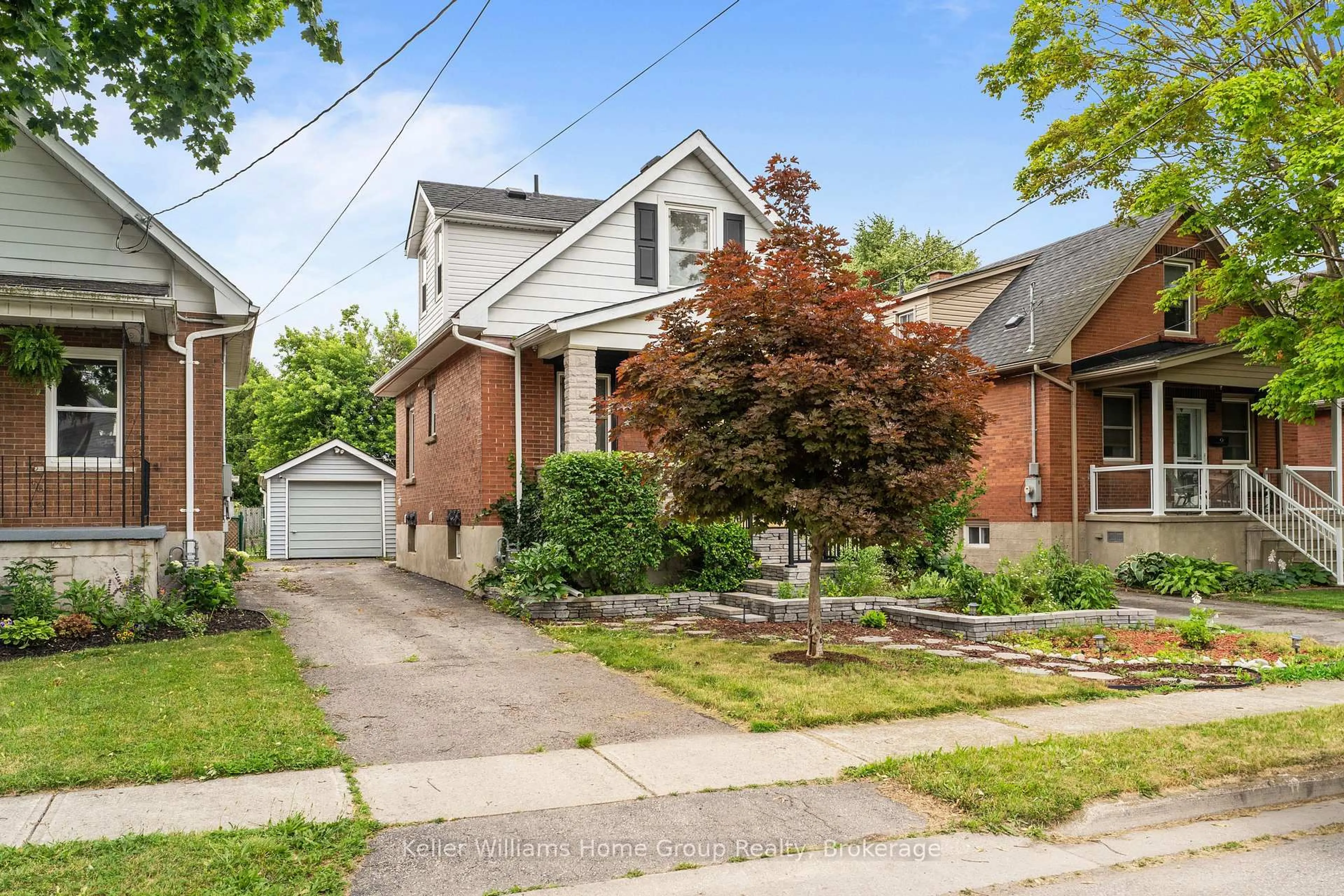 Home with brick exterior material, street for 16 Walter St, Guelph Ontario N1E 5P1