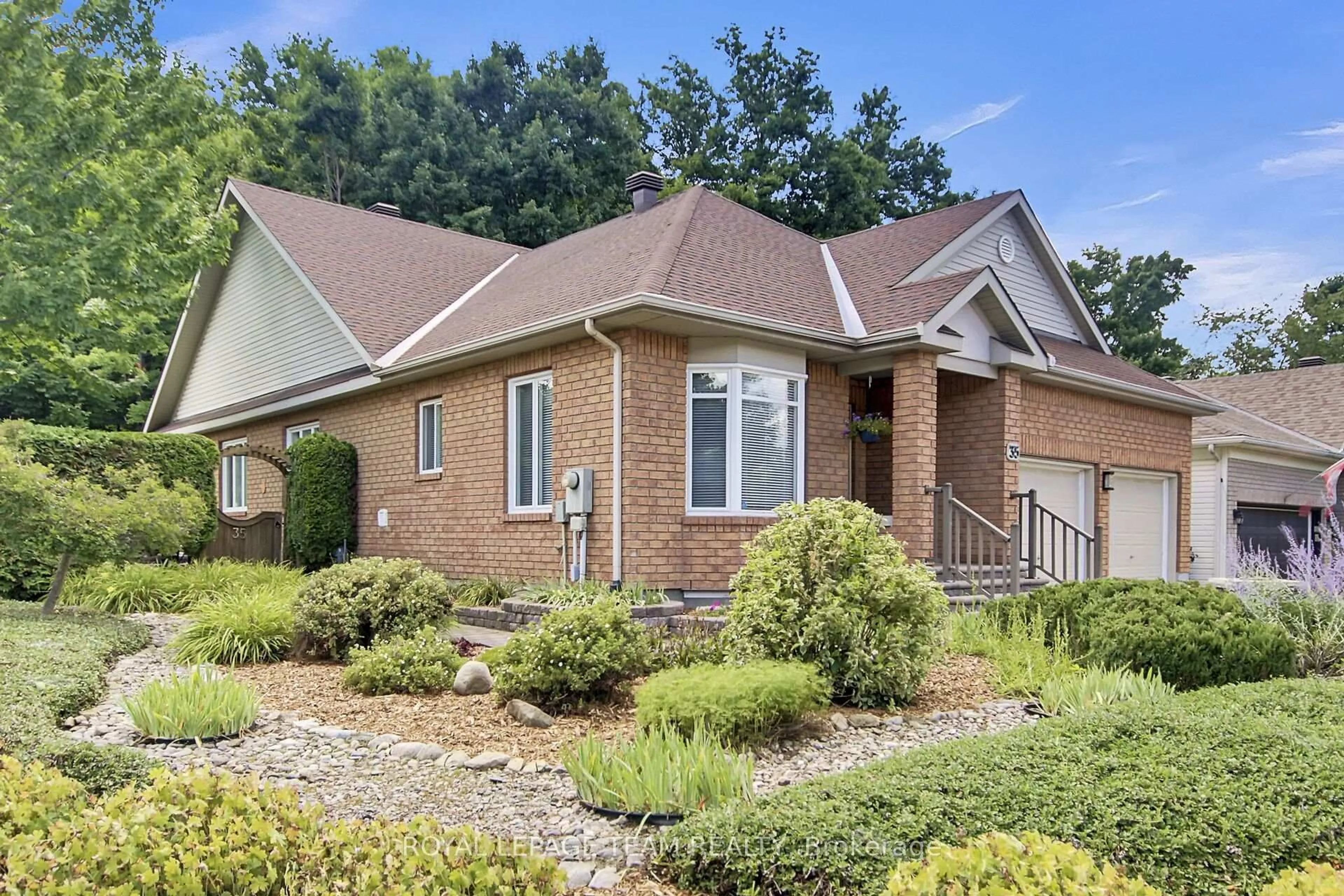 Home with brick exterior material, street for 35 Fieldcrest Ave, Ottawa Ontario K2J 4Y8