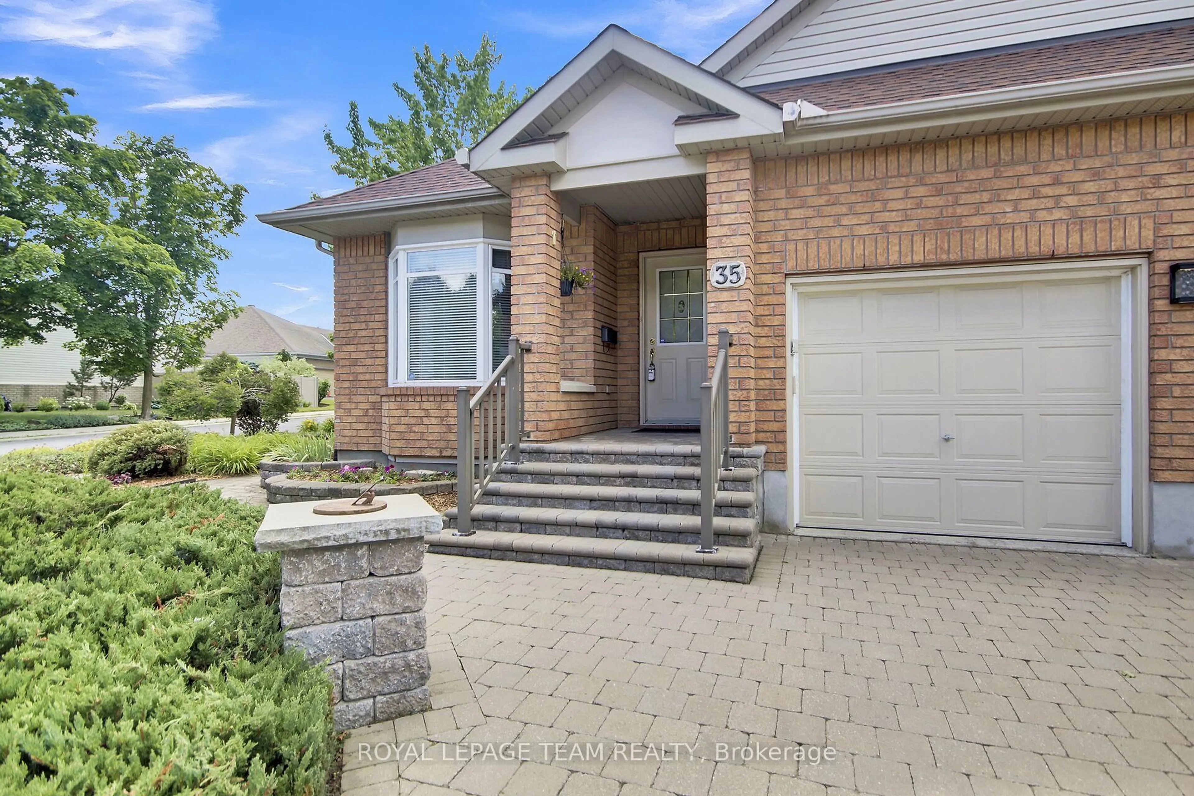 Home with brick exterior material, street for 35 Fieldcrest Ave, Ottawa Ontario K2J 4Y8