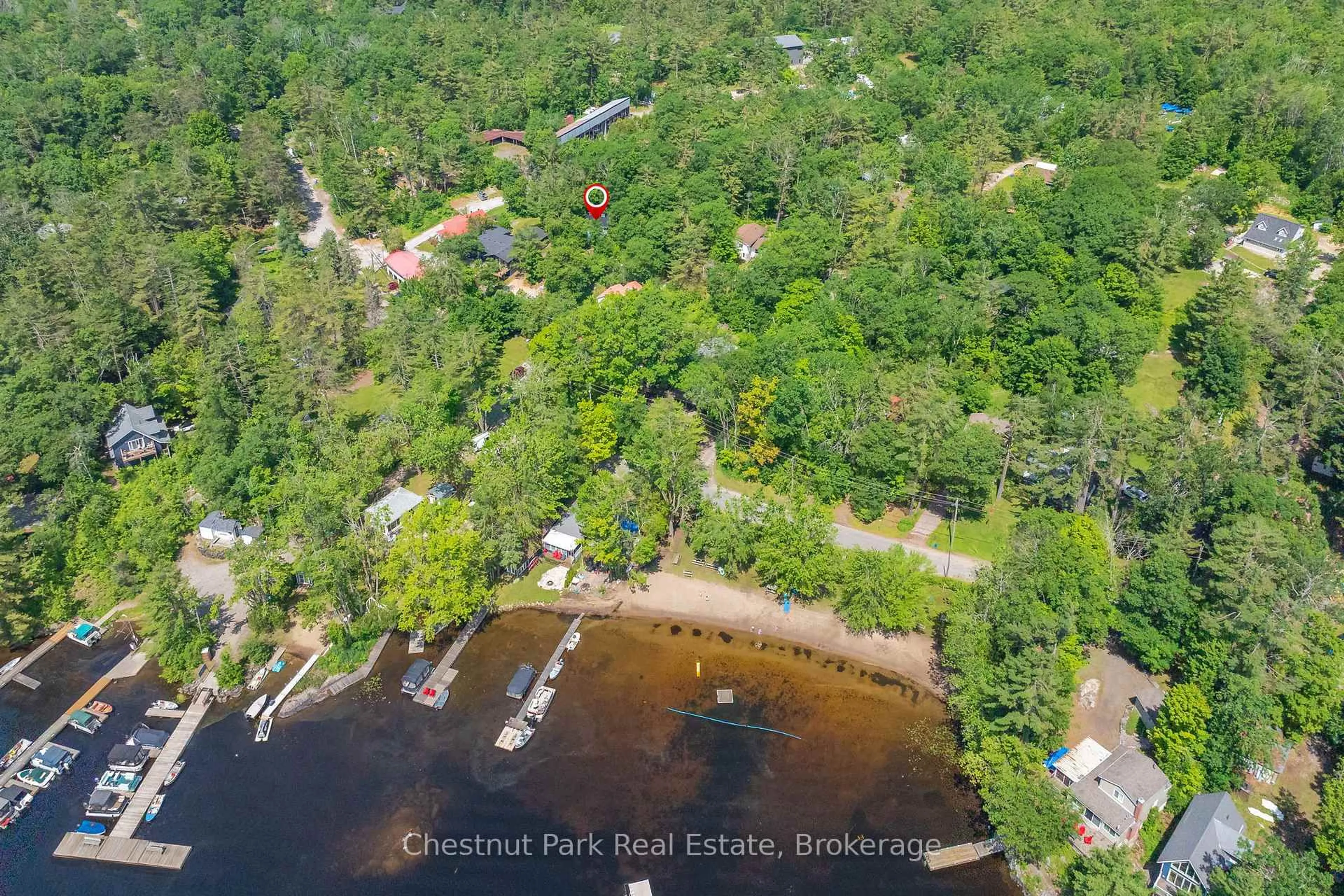 A pic from outside/outdoor area/front of a property/back of a property/a pic from drone, water/lake/river/ocean view for 1185 North Kahshe Lake Rd #2, Gravenhurst Ontario P0E 1G0