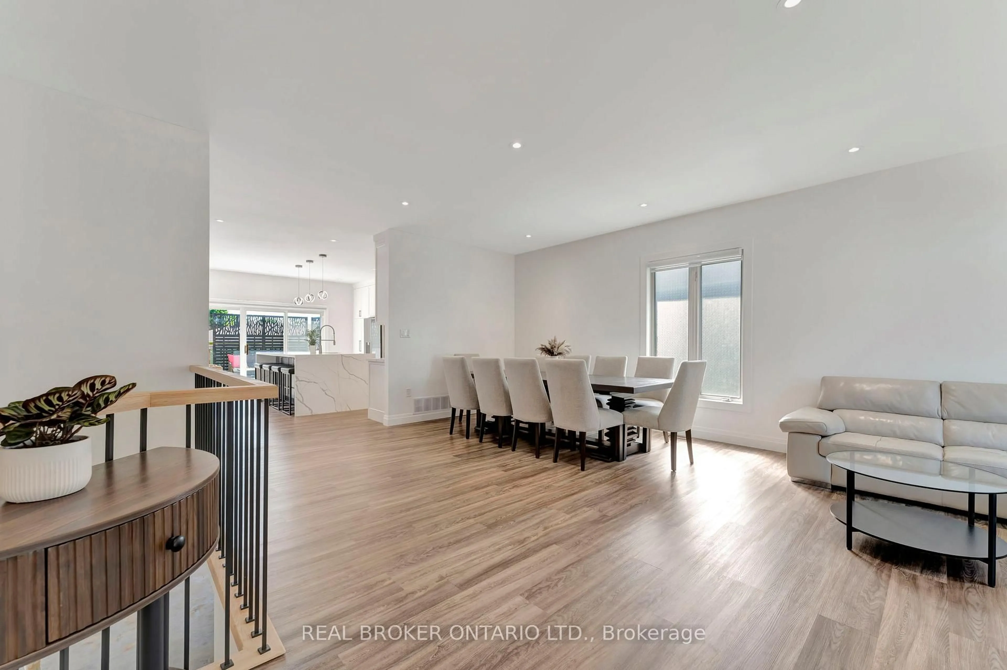 Open concept kitchen, wood/laminate floor for 16 Casson Lane, Brantford Ontario N3R 7Z4