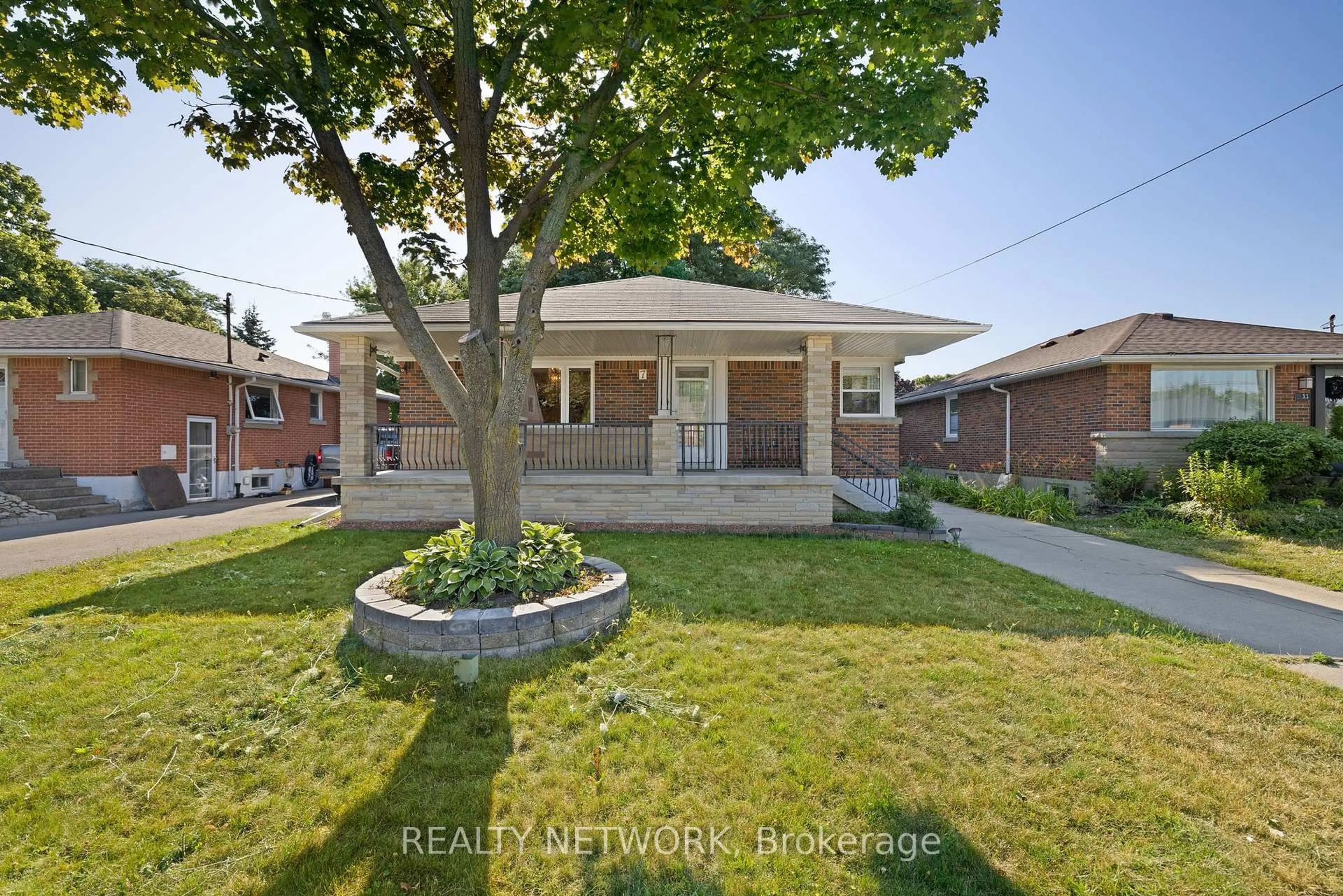 Home with brick exterior material, street for 7 Greenwood St, Hamilton Ontario L8T 3N2