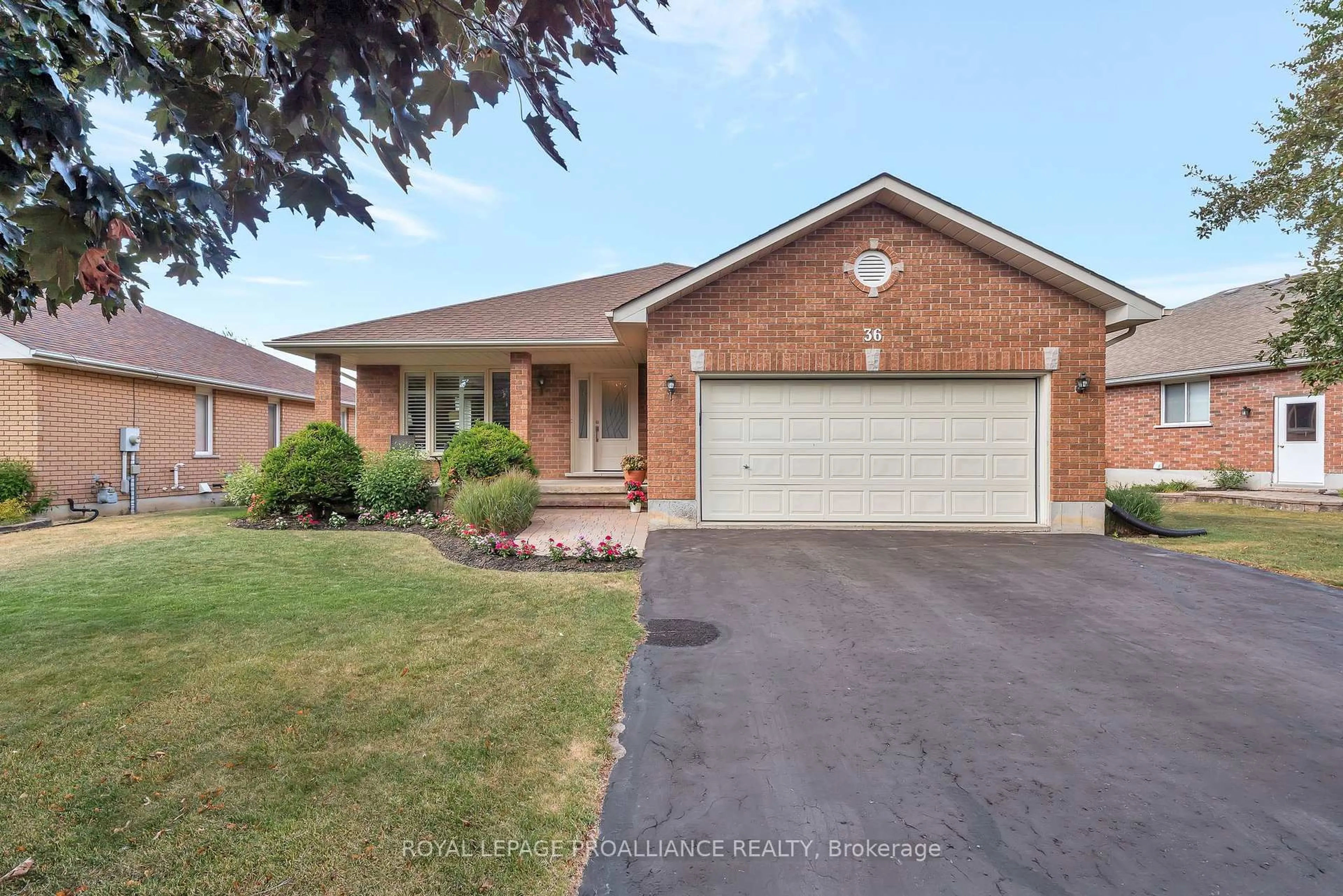 Home with brick exterior material, street for 36 Oak Ridge Blvd, Belleville Ontario K8N 5W1