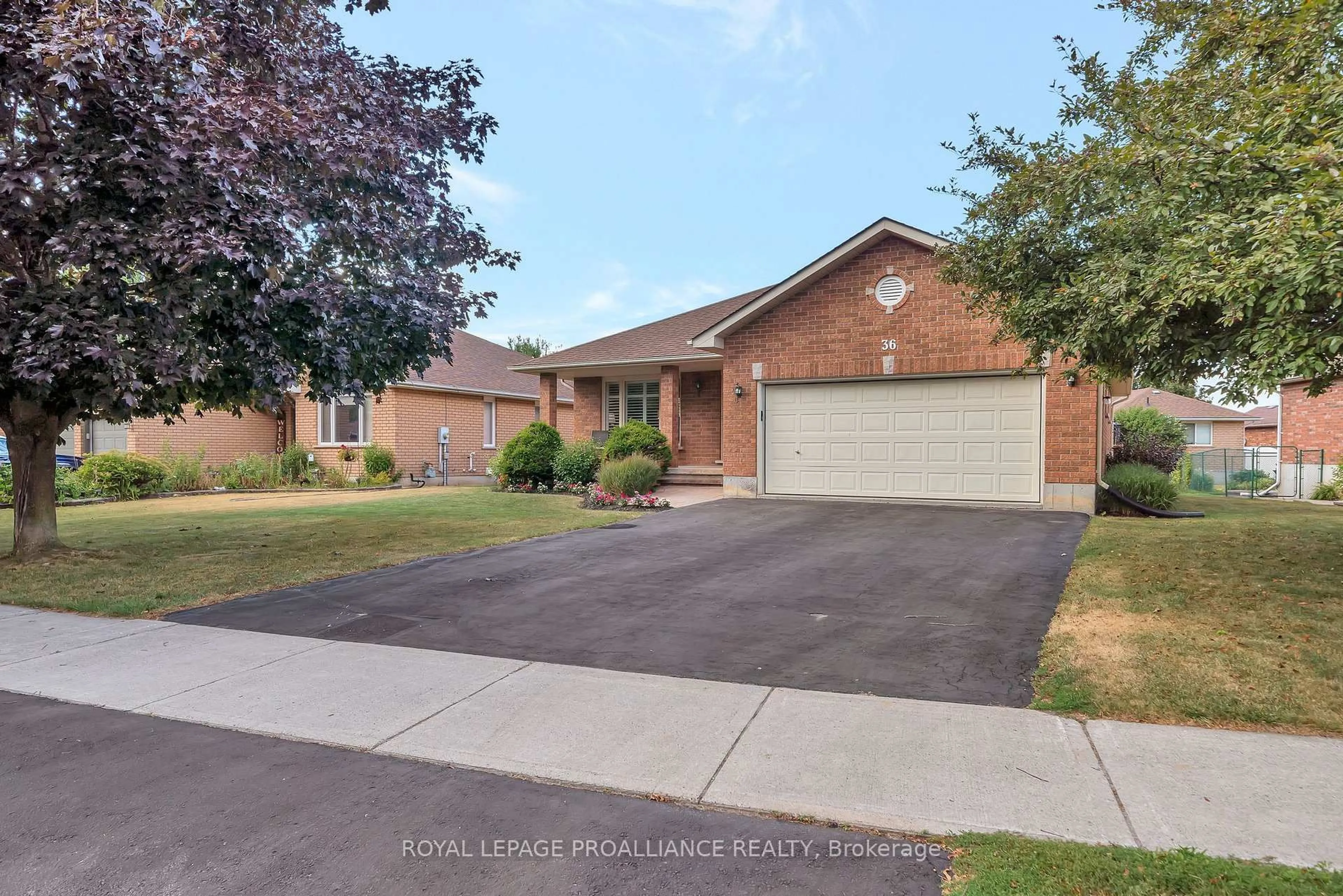 Home with brick exterior material, street for 36 Oak Ridge Blvd, Belleville Ontario K8N 5W1