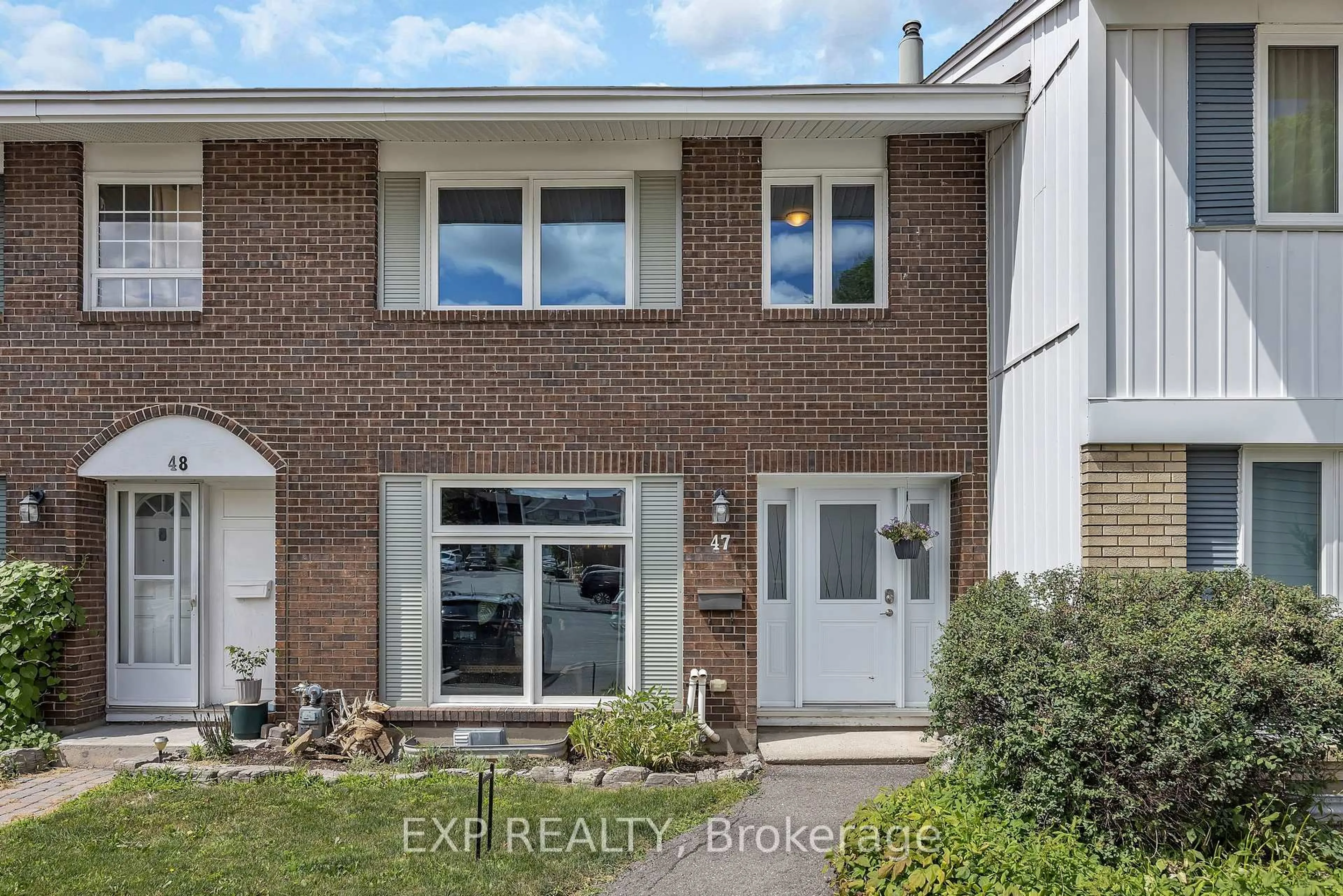 Home with brick exterior material, street for 2300 Ogilvie Rd #47, Ottawa Ontario K1J 7X8