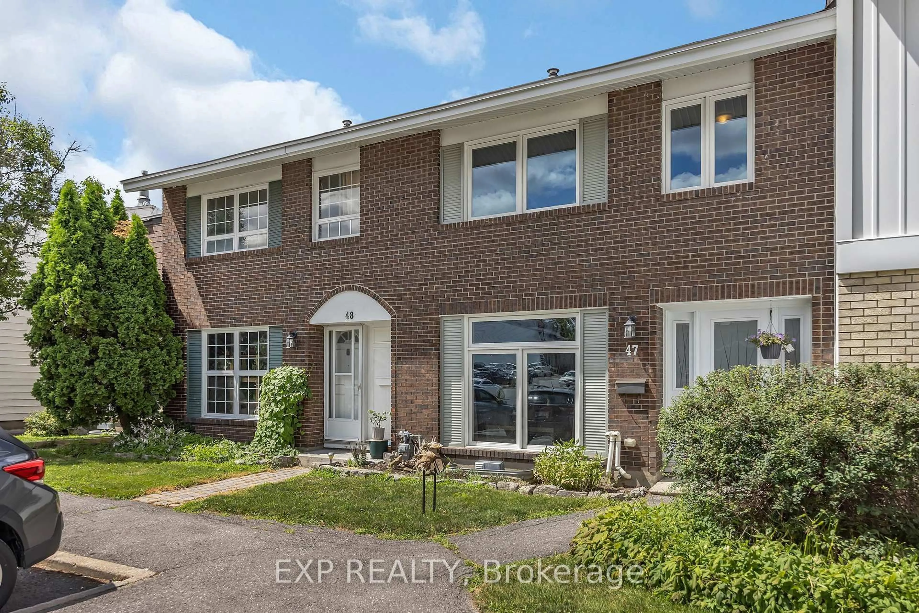 Home with brick exterior material, street for 2300 Ogilvie Rd #47, Ottawa Ontario K1J 7X8