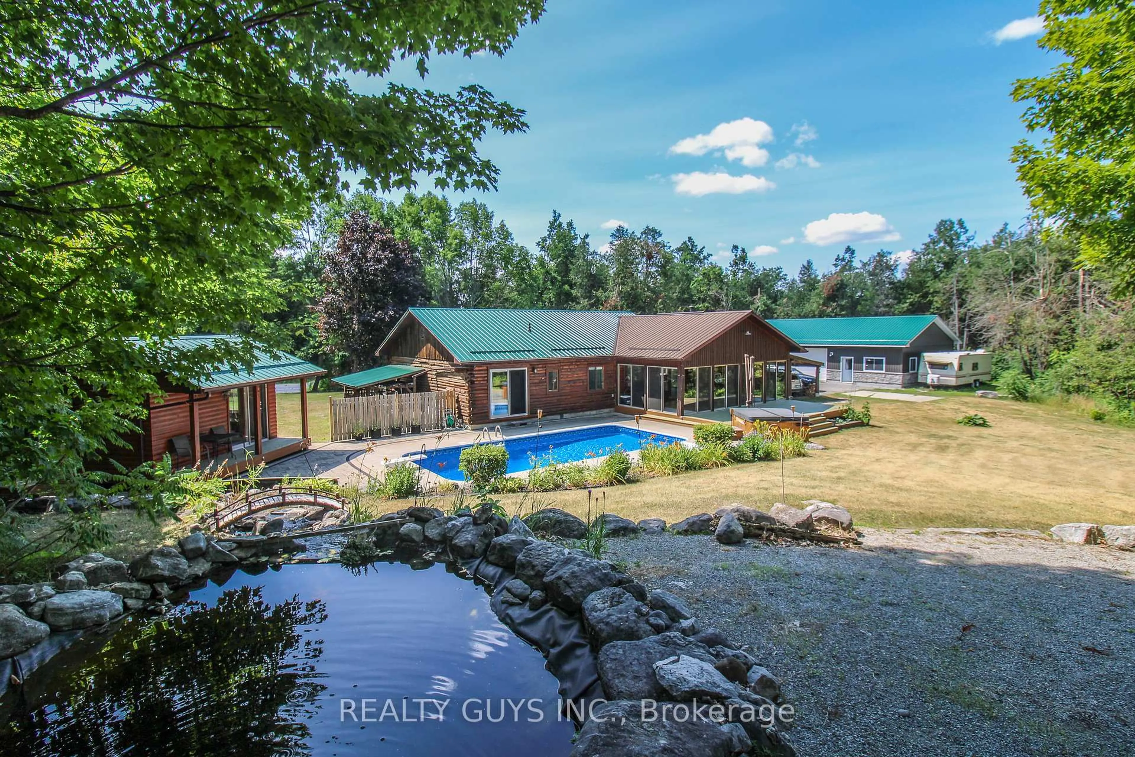 A pic from outside/outdoor area/front of a property/back of a property/a pic from drone, water/lake/river/ocean view for 891 COUNTY Rd, Trent Lakes Ontario K0M 1A0