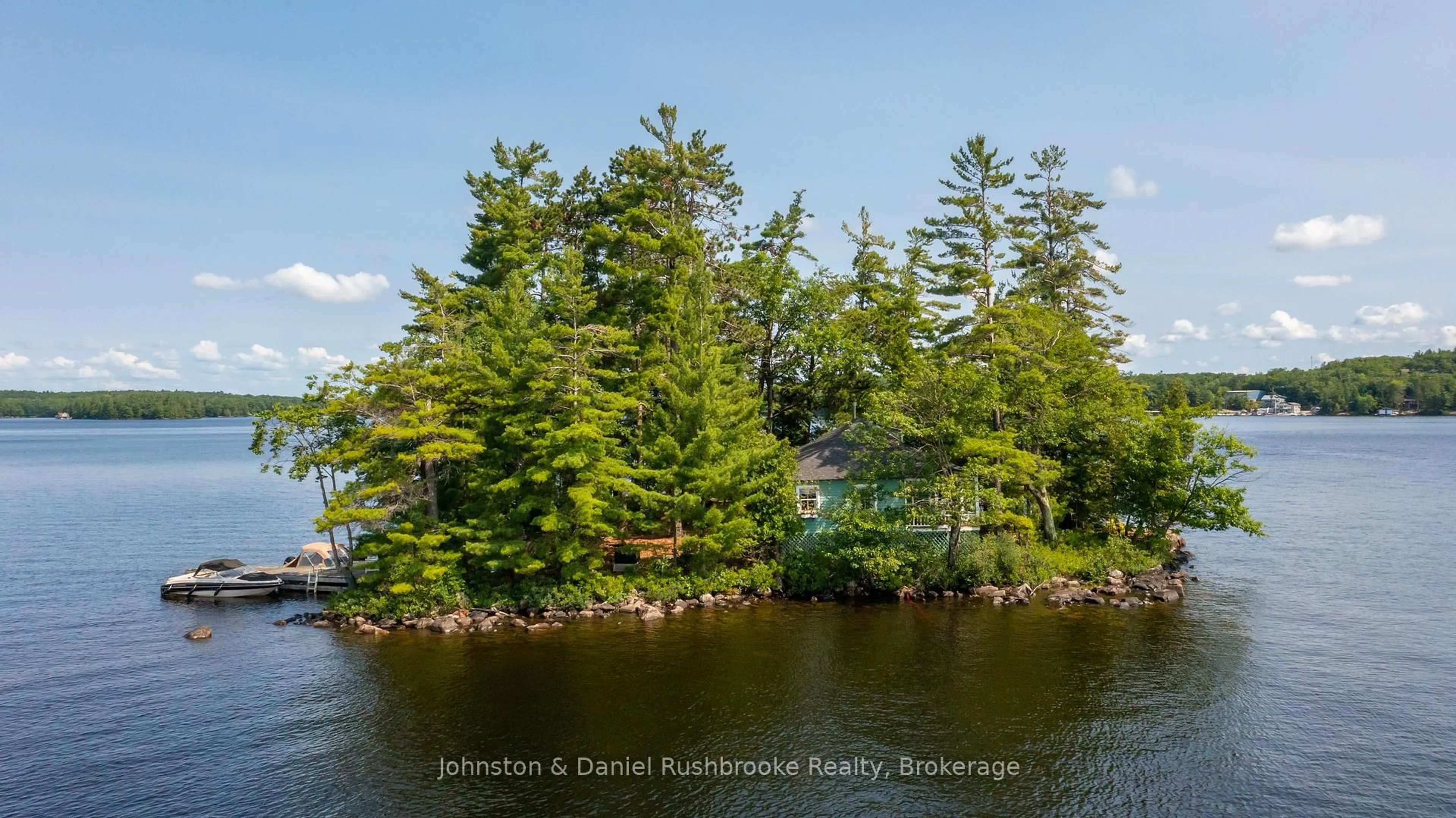 A pic from outside/outdoor area/front of a property/back of a property/a pic from drone, water/lake/river/ocean view for 1000 Regatta Island, Bracebridge Ontario P1L 1W8