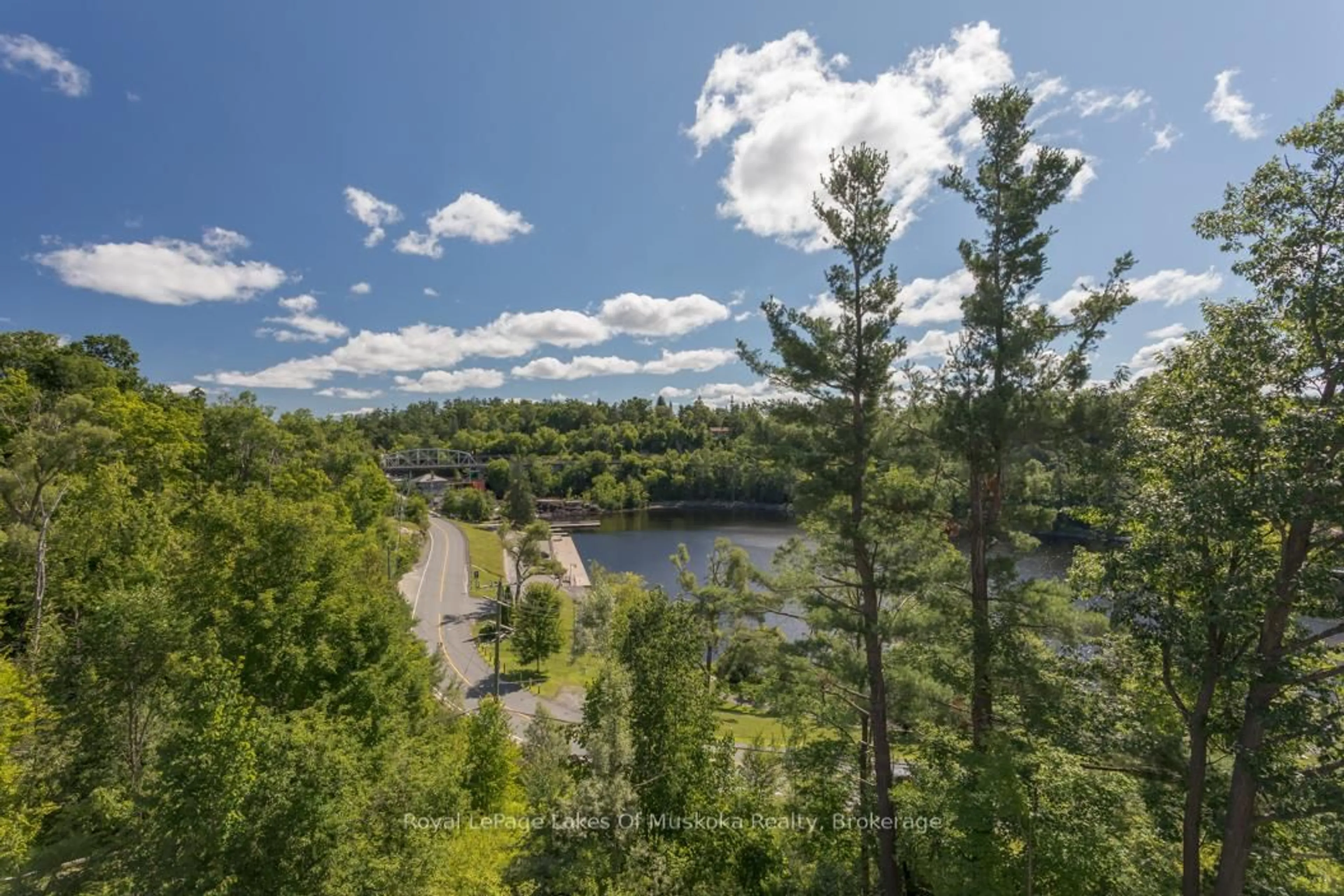 A pic from outside/outdoor area/front of a property/back of a property/a pic from drone, water/lake/river/ocean view for 10A Kimberley St #202, Bracebridge Ontario P1L 0A4