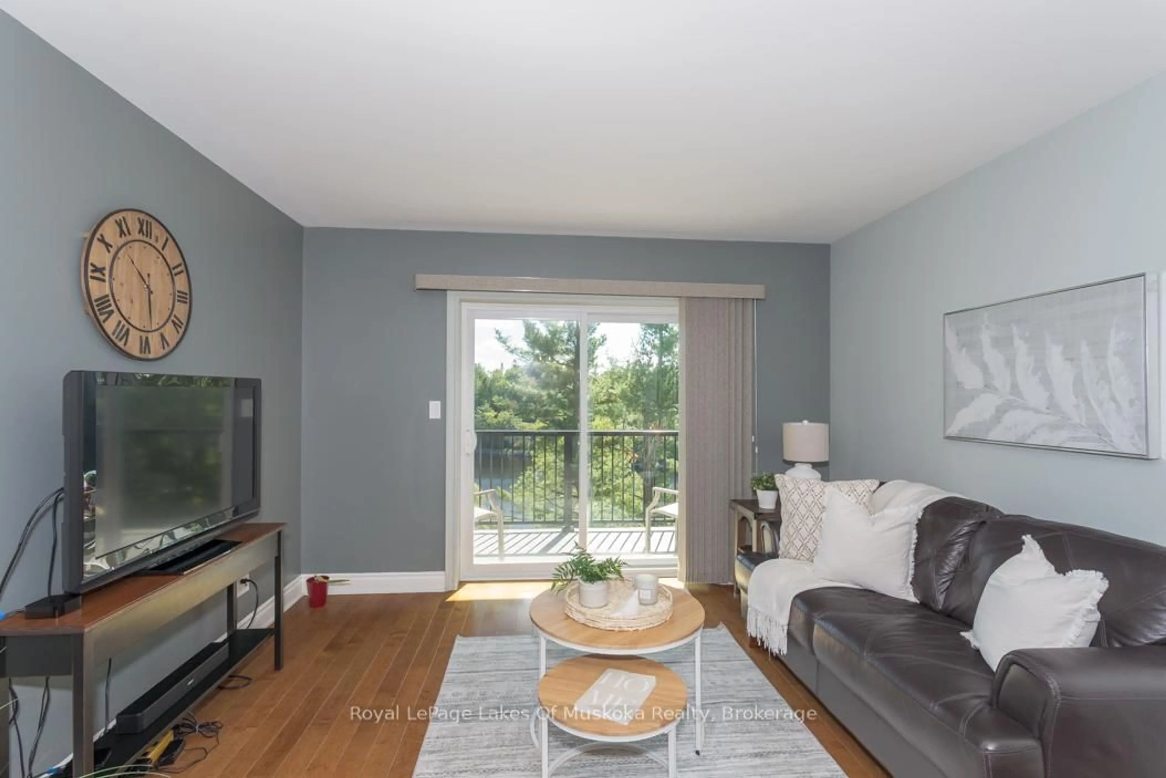 Living room with furniture, wood/laminate floor for 10A Kimberley St #202, Bracebridge Ontario P1L 0A4