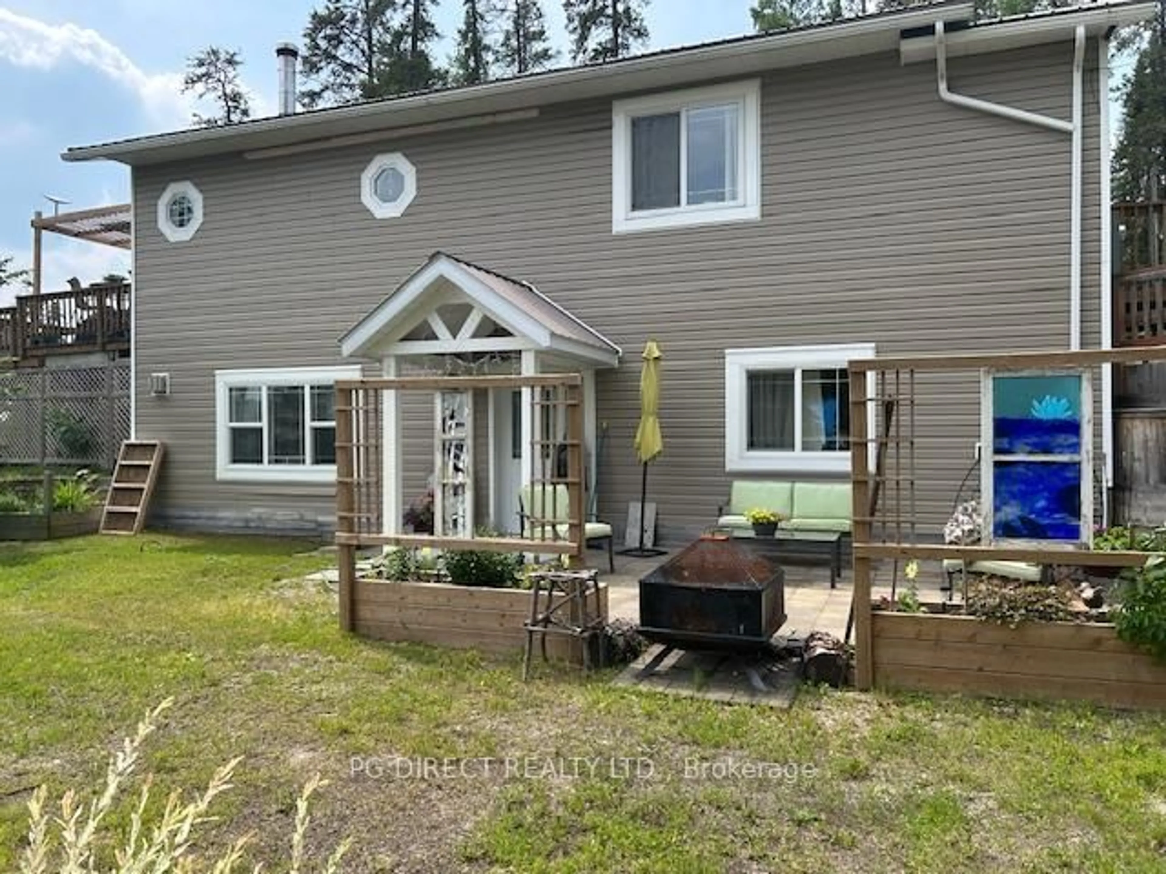 A pic from outside/outdoor area/front of a property/back of a property/a pic from drone, unknown for 67 MacIntosh Rd, Greenstone Ontario P0T 1M0
