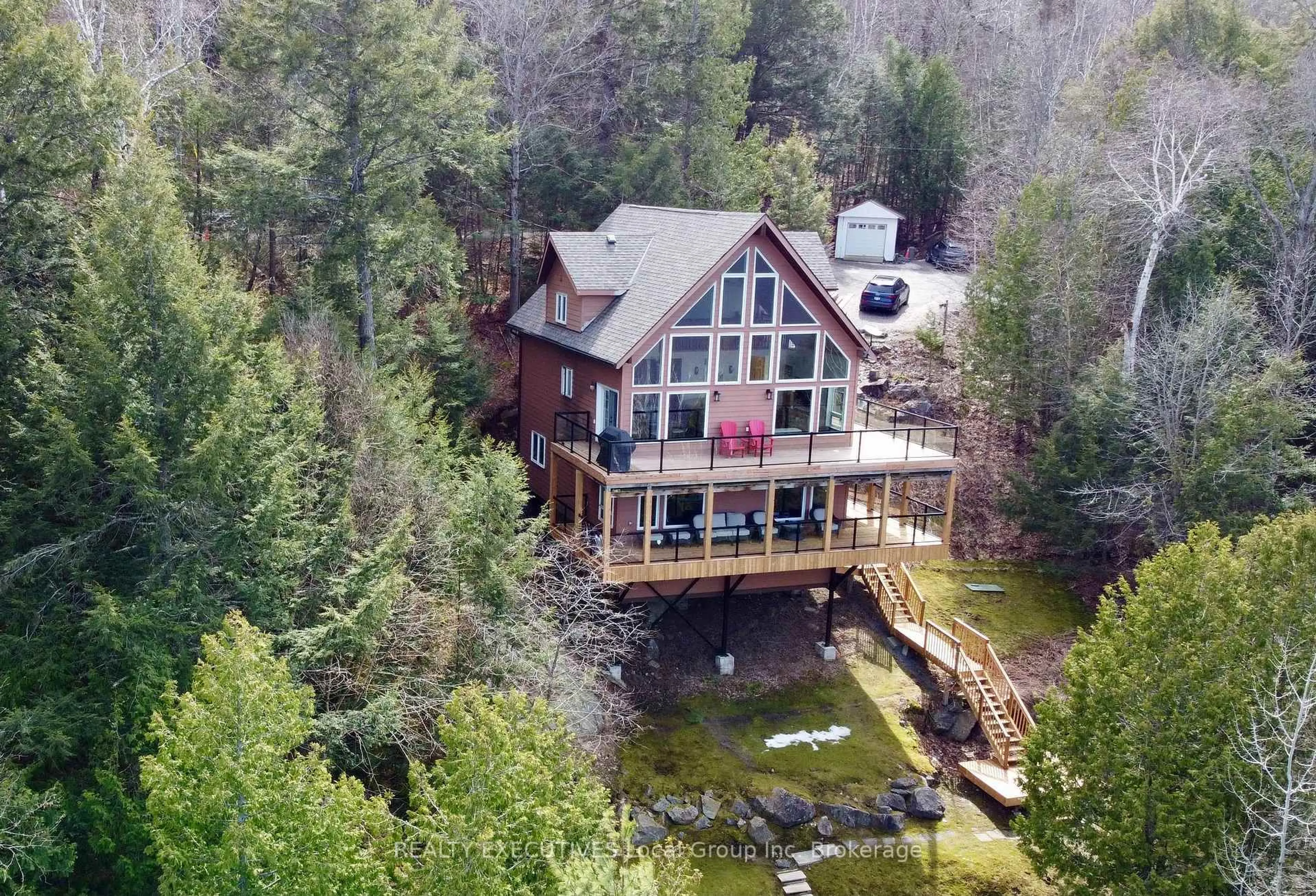 A pic from outside/outdoor area/front of a property/back of a property/a pic from drone, water/lake/river/ocean view for 400C Shorewood Rd, North Bay Ontario P1B 8G4
