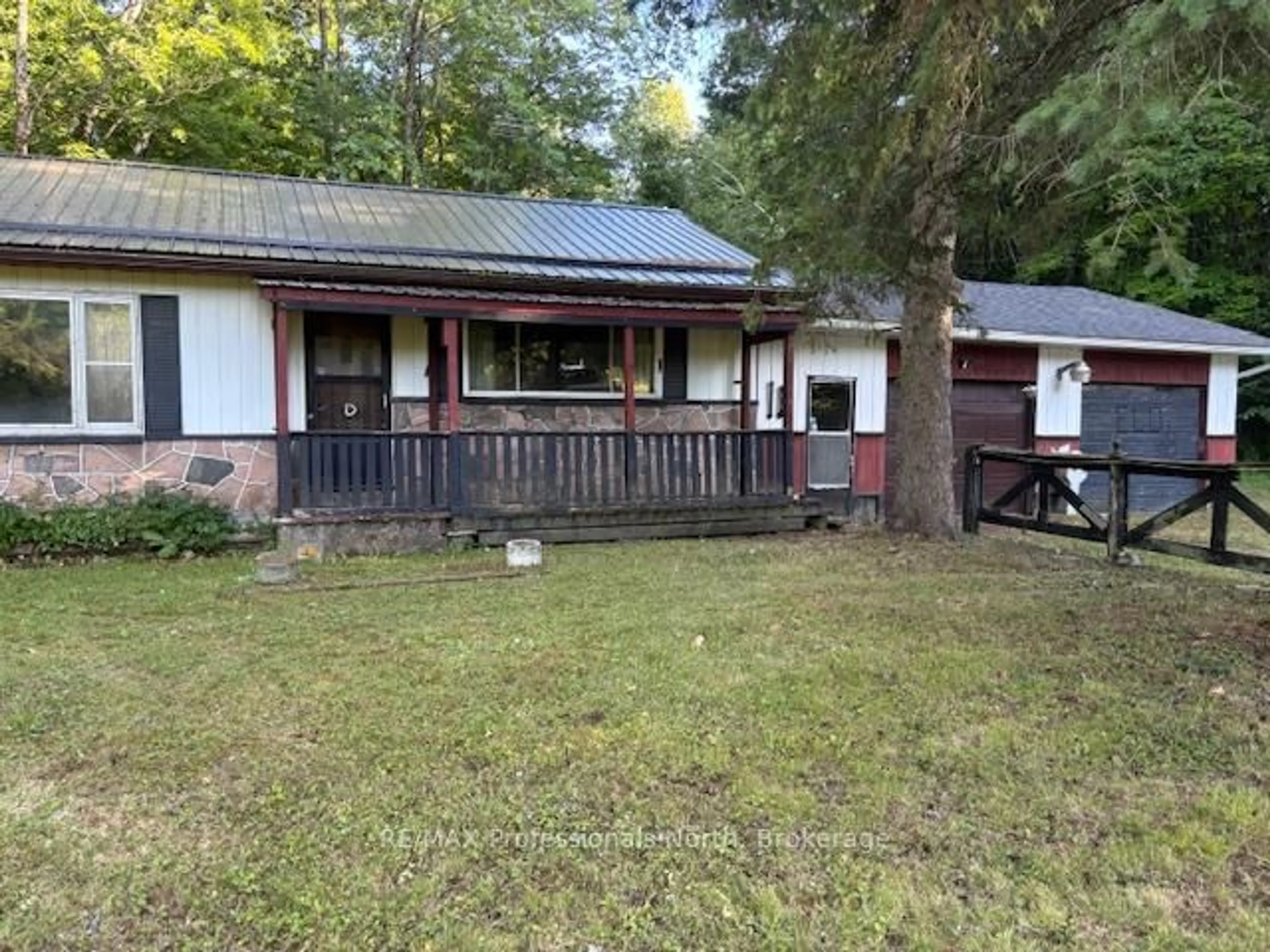 A pic from outside/outdoor area/front of a property/back of a property/a pic from drone, unknown for 1078 South Lake Rd, Minden Hills Ontario K0M 2K0
