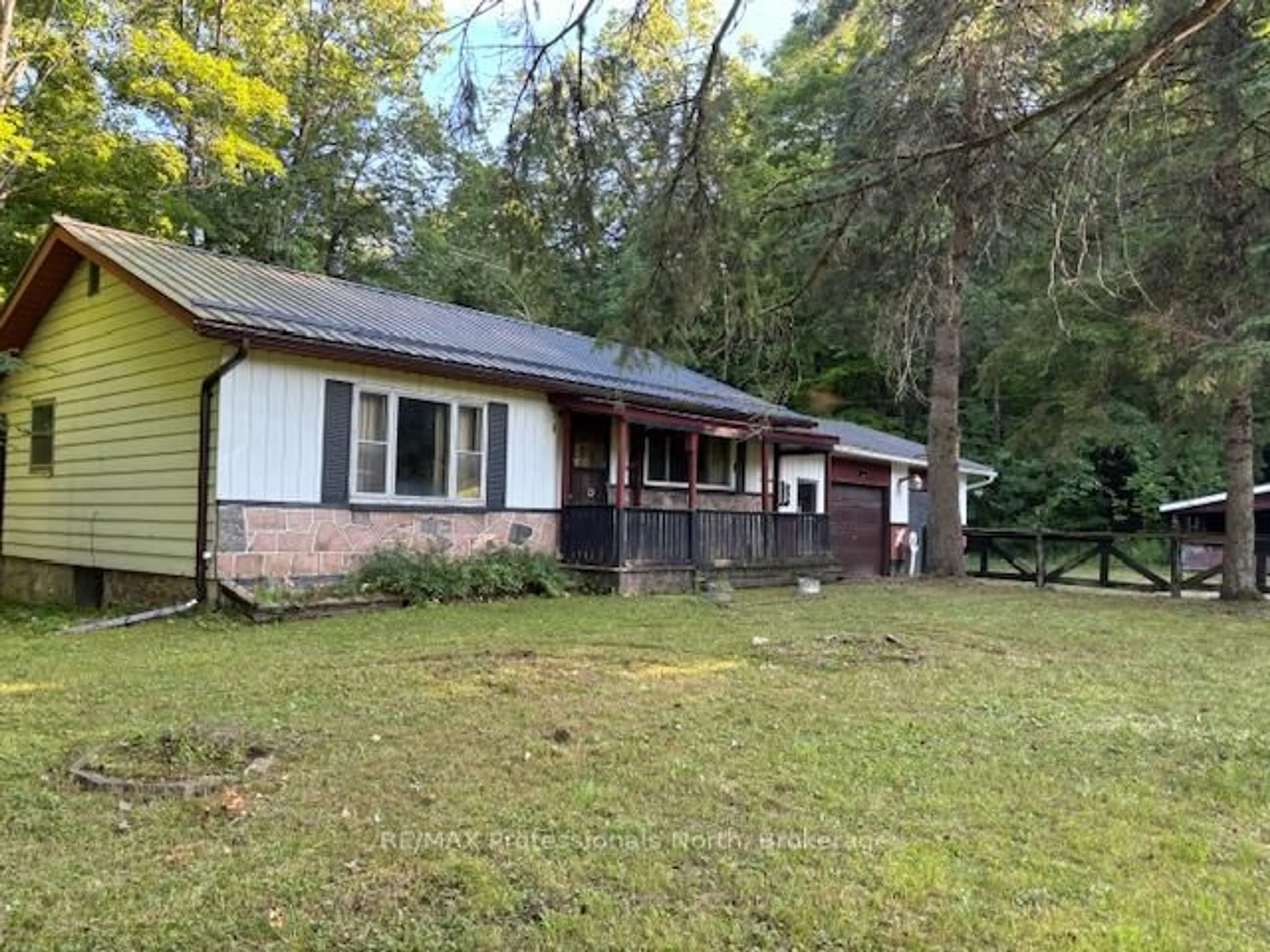 A pic from outside/outdoor area/front of a property/back of a property/a pic from drone, unknown for 1078 South Lake Rd, Minden Hills Ontario K0M 2K0