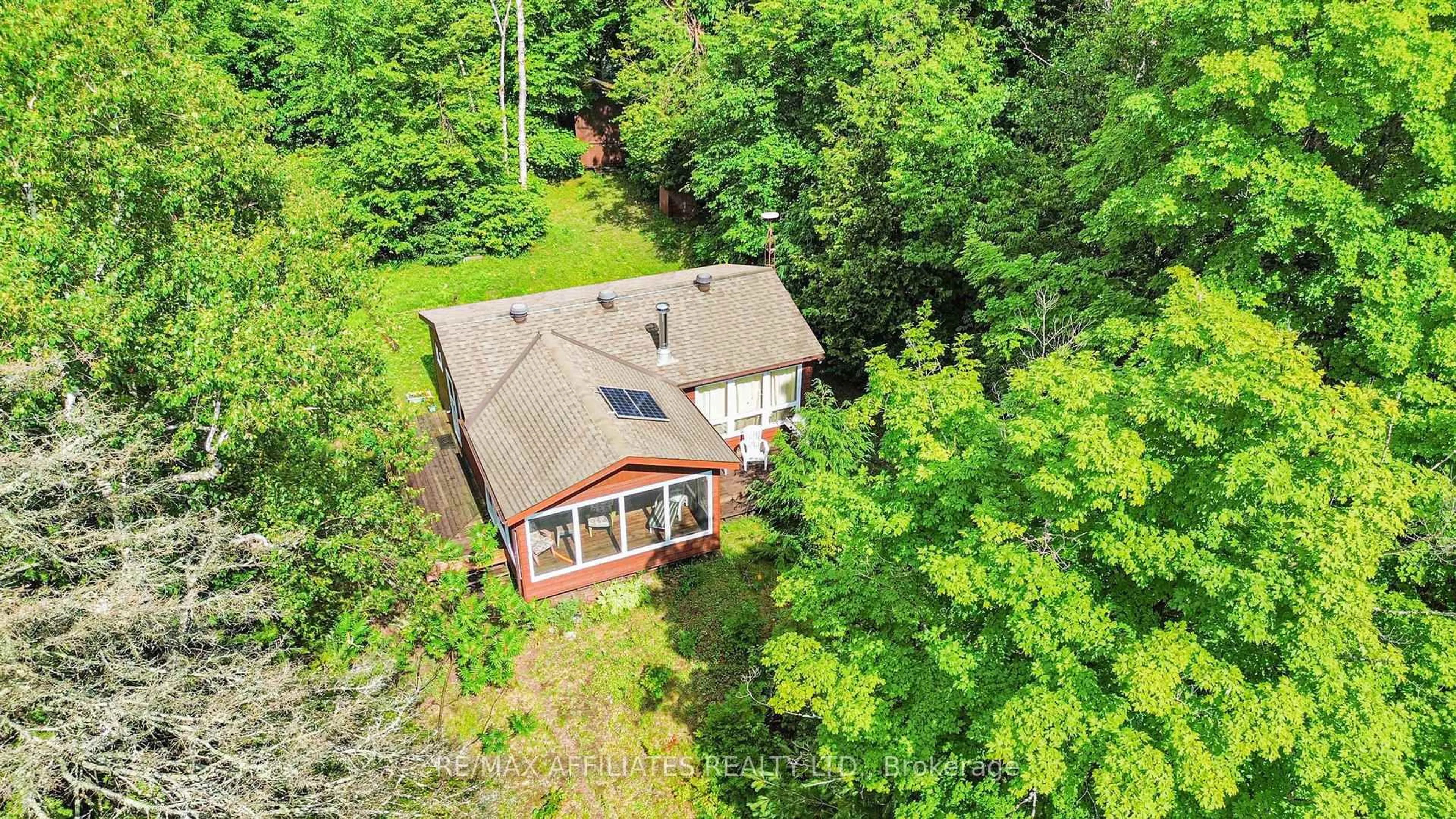 A pic from outside/outdoor area/front of a property/back of a property/a pic from drone, unknown for 1015 Penyck  Lake Lane, Sharbot Lake Ontario K0H 2P0