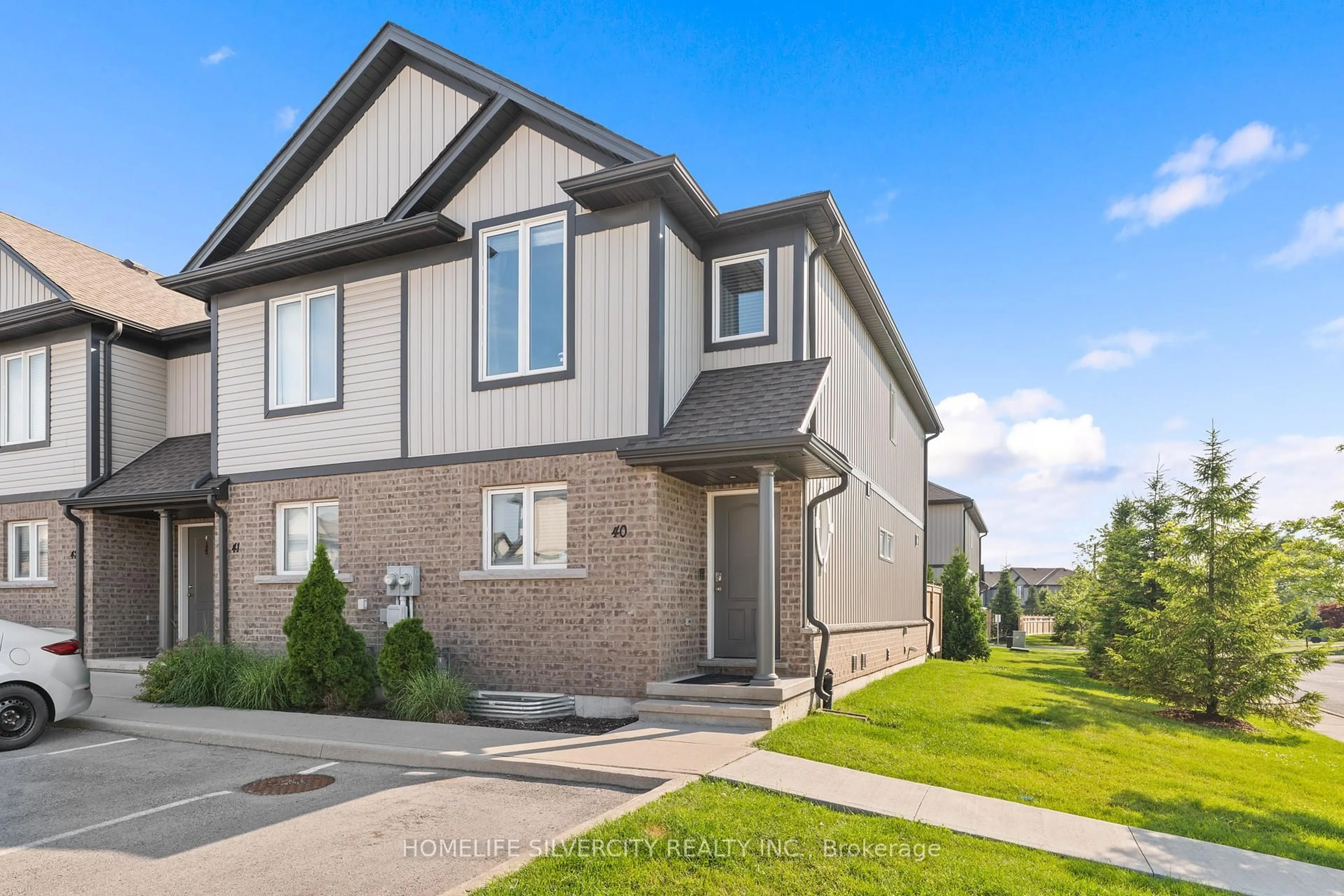 Home with brick exterior material, street for 7768 Ascot Circ #40, Niagara Falls Ontario L2H 3P9