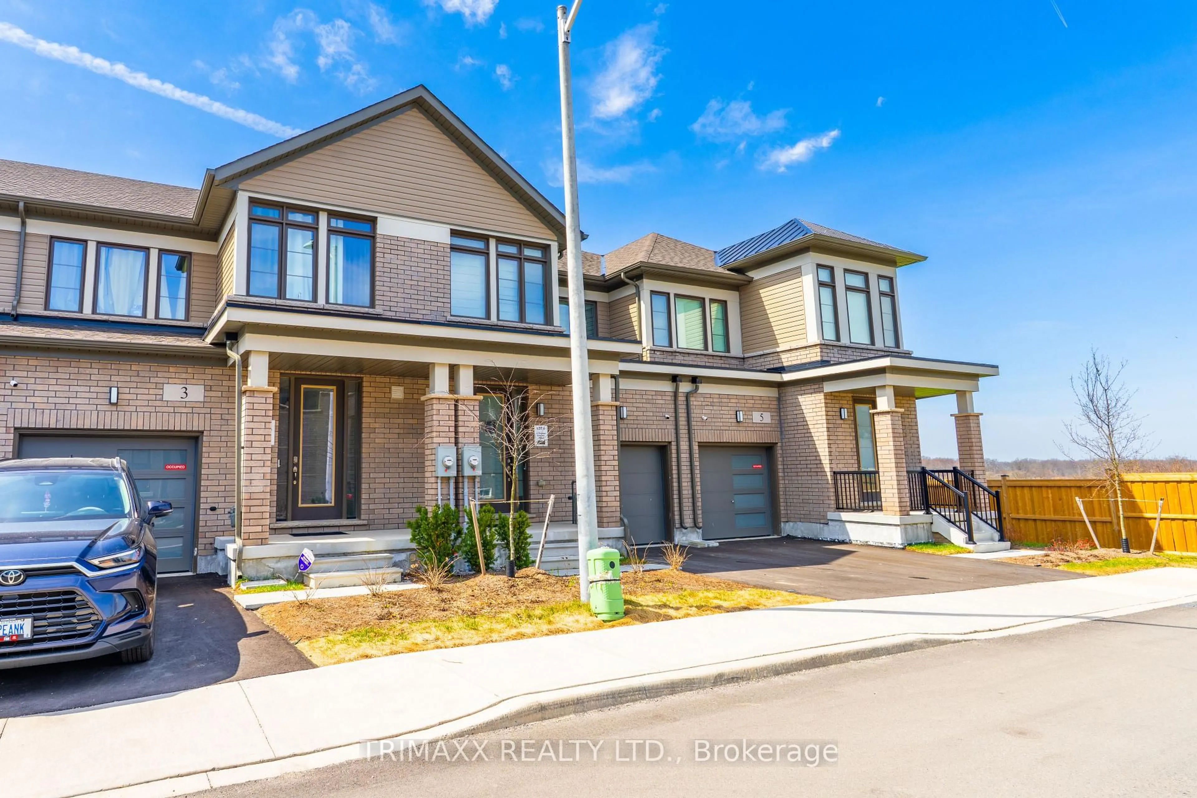 Home with brick exterior material, street for 10 Freedom Cres #4, Hamilton Ontario L0R 1W0