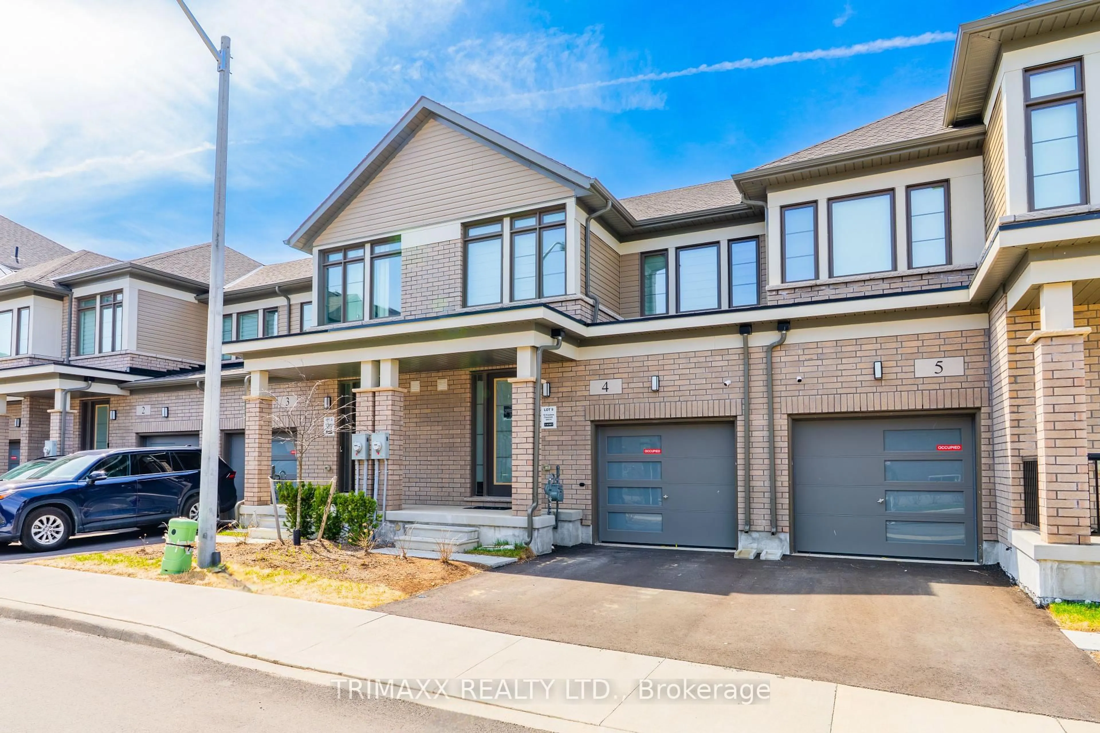Home with brick exterior material, street for 10 Freedom Cres #4, Hamilton Ontario L0R 1W0