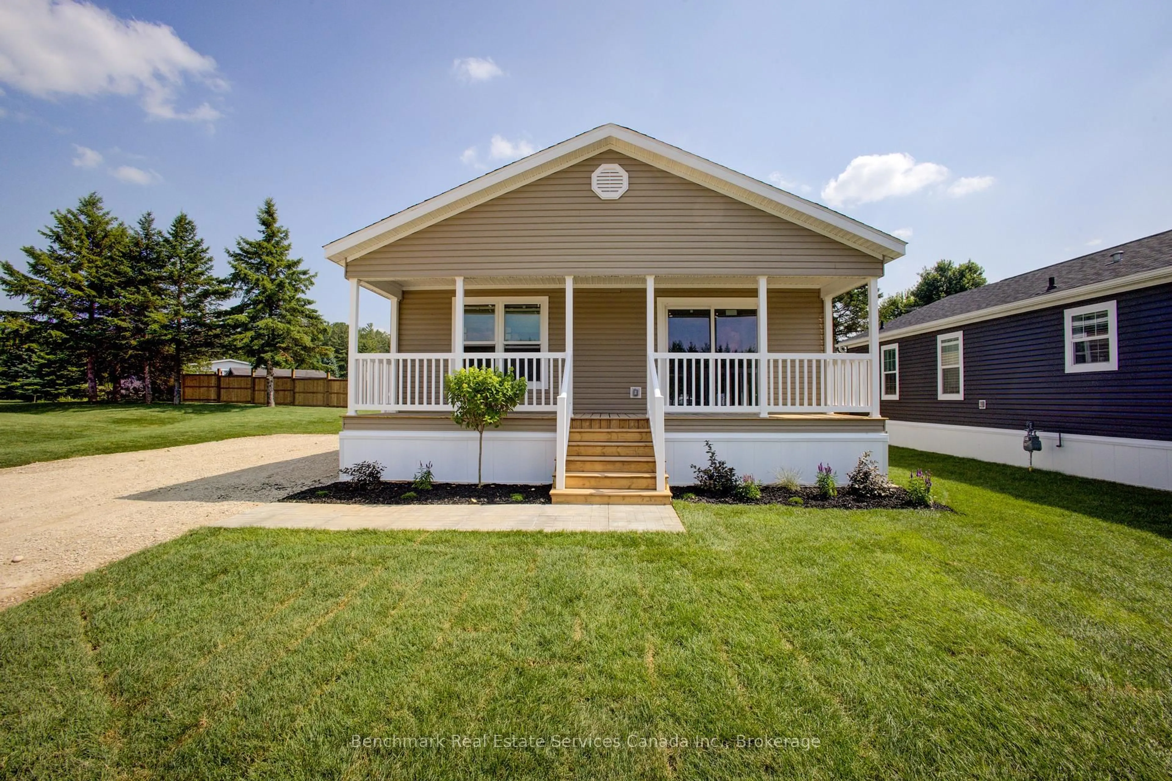 Home with vinyl exterior material, street for 210 Spruce Dr, West Grey Ontario N4N 3B8