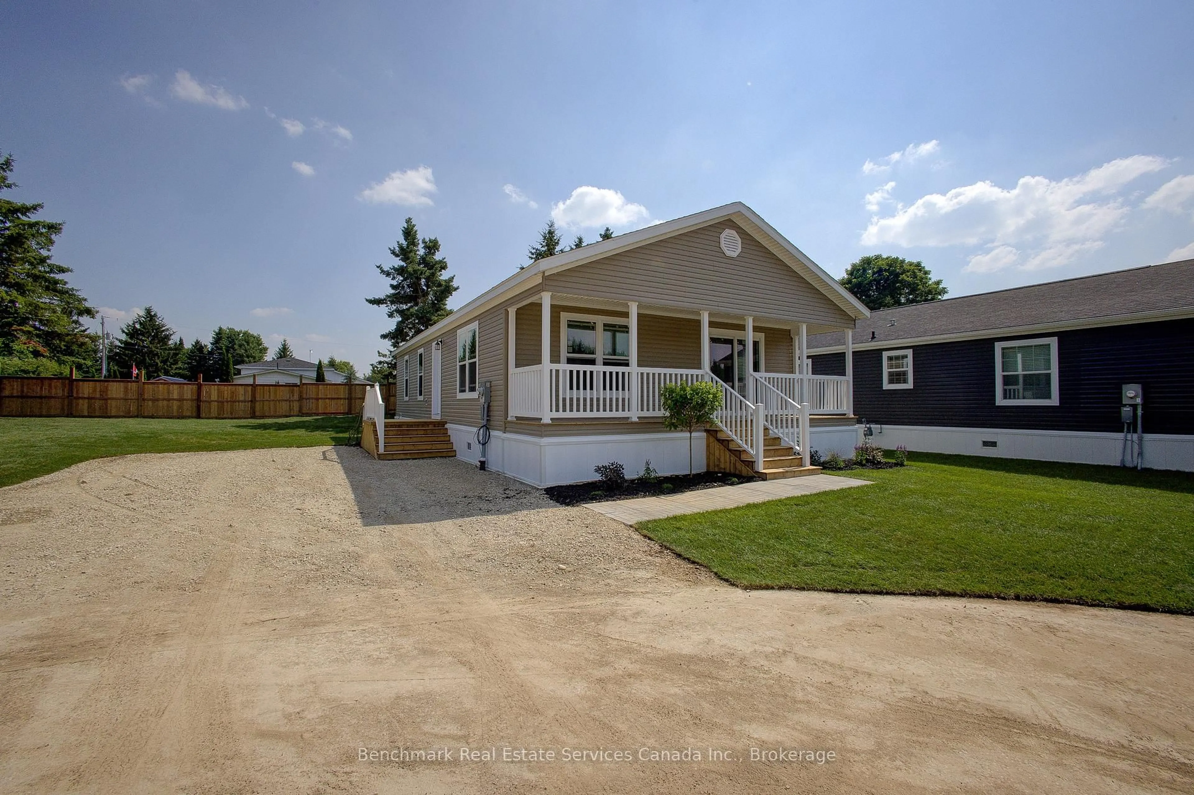Home with vinyl exterior material, street for 210 Spruce Dr, West Grey Ontario N4N 3B8