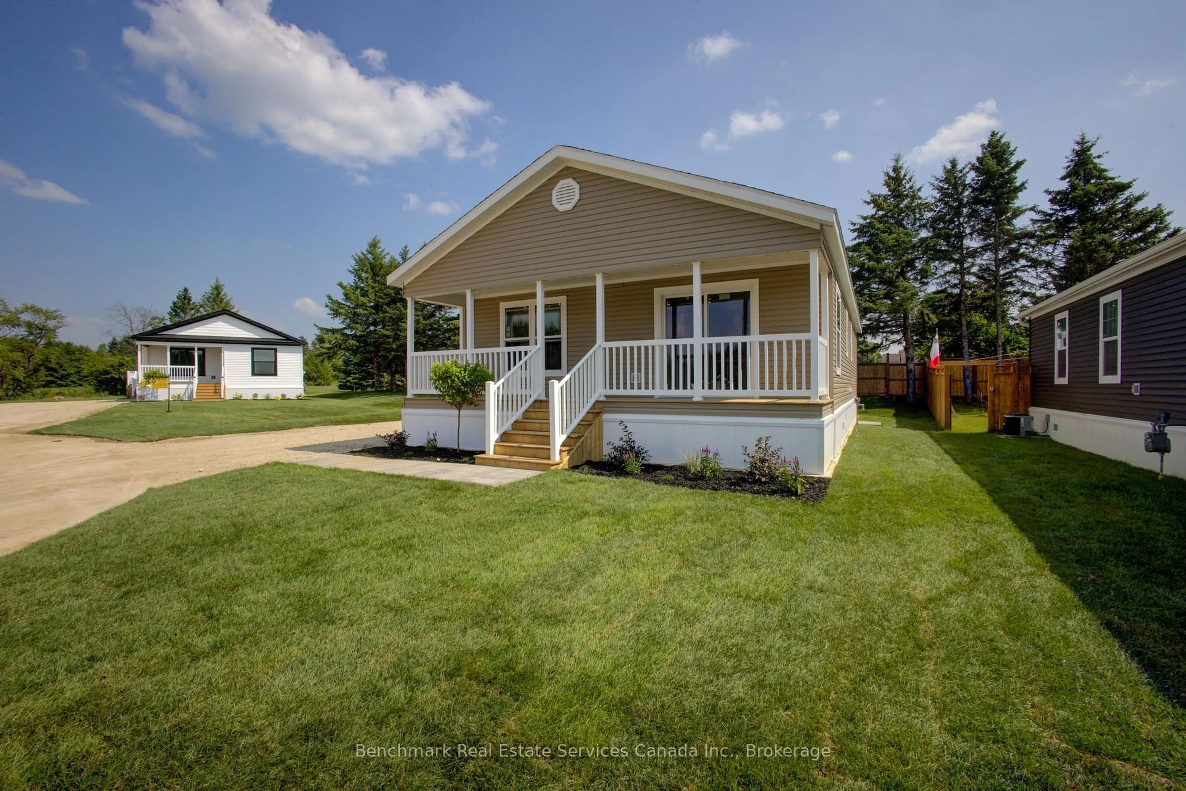 Home with vinyl exterior material, street for 210 Spruce Dr, West Grey Ontario N4N 3B8