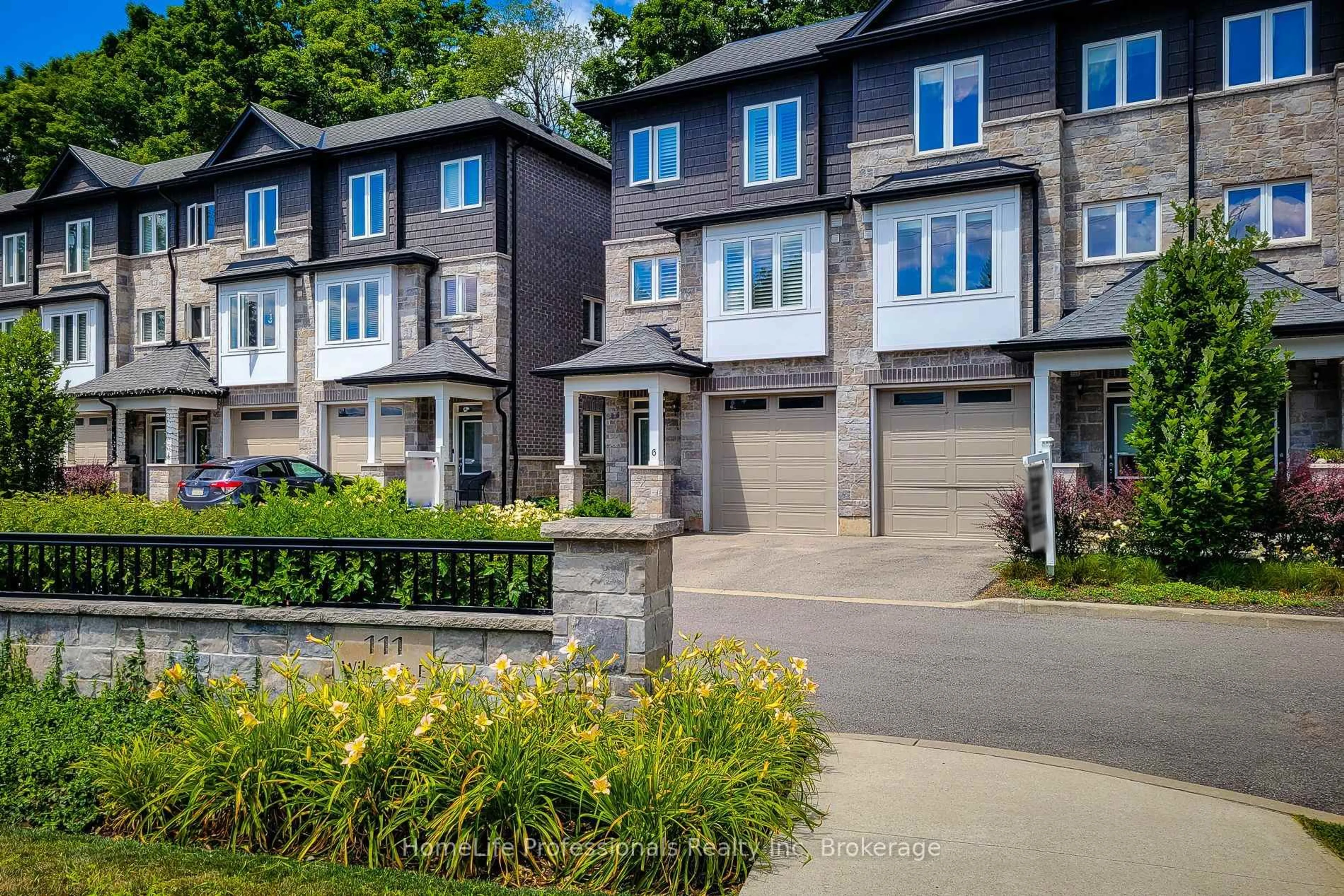Home with brick exterior material, street for 111 Wilson St #7, Hamilton Ontario L9B 2G7