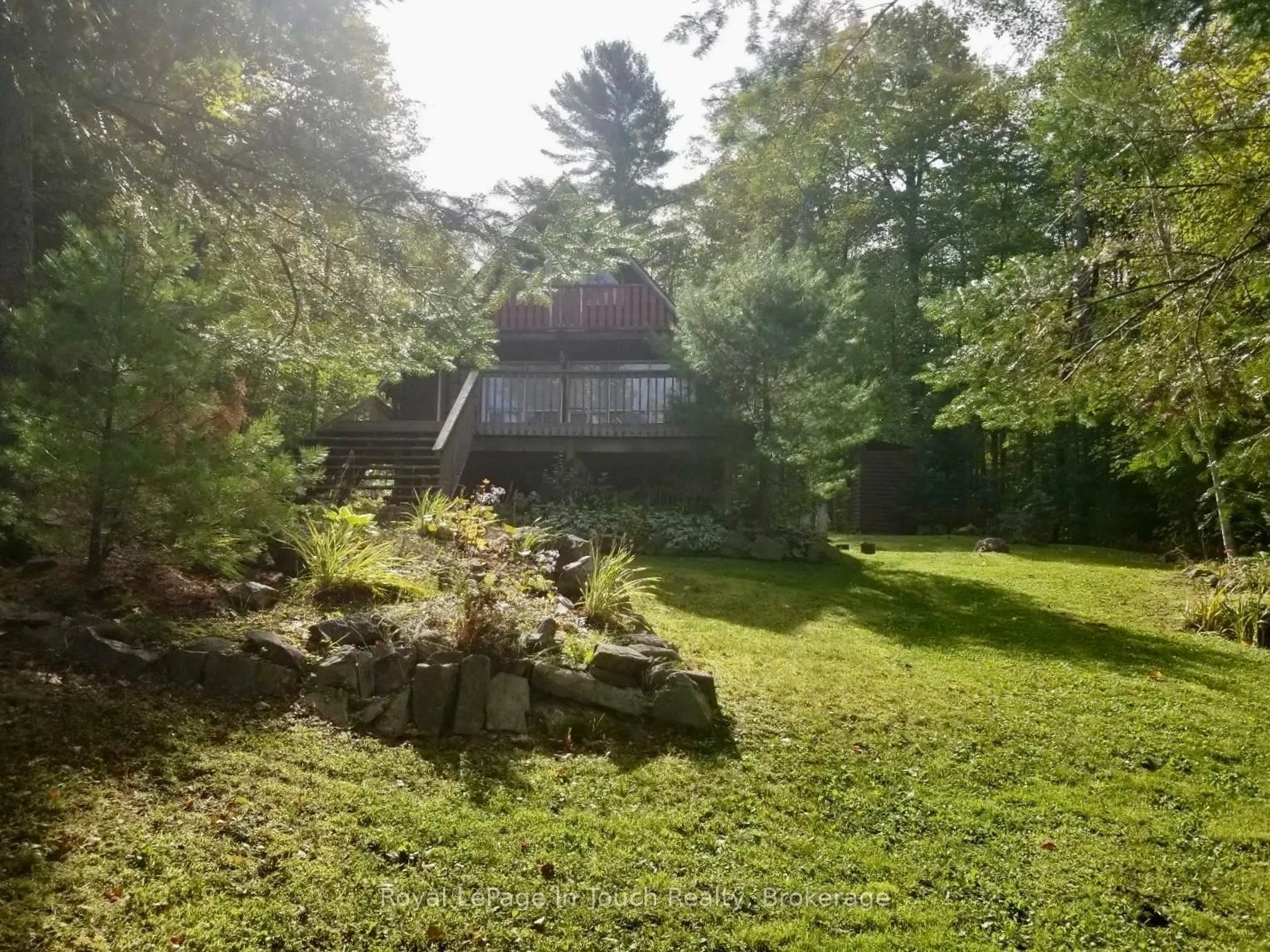 A pic from outside/outdoor area/front of a property/back of a property/a pic from drone, forest/trees view for 2 Severn River Shore, Muskoka Lakes Ontario P0C 1M0