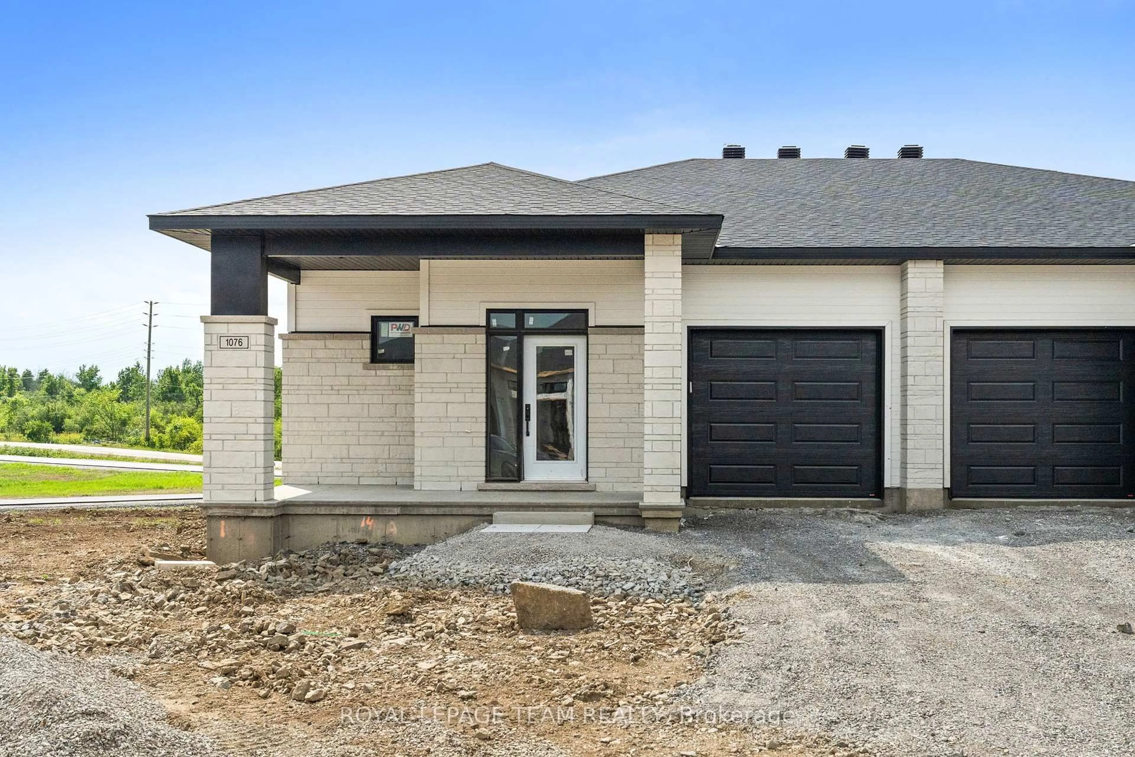 Home with brick exterior material, street for 1076 Moore St, Brockville Ontario K6V 7N1