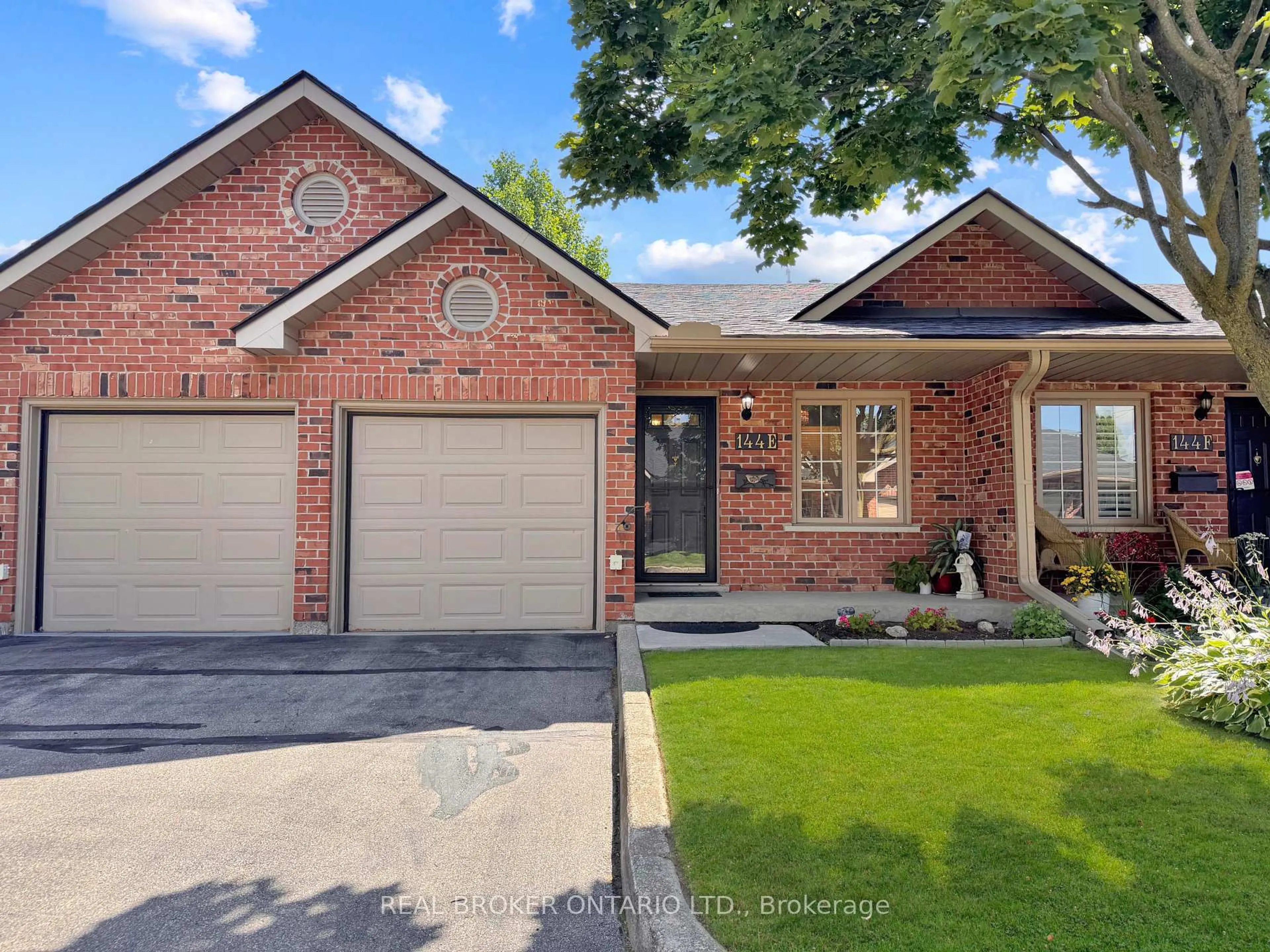 Home with brick exterior material, street for 144 Wood St #E, Brantford Ontario N3R 2L5