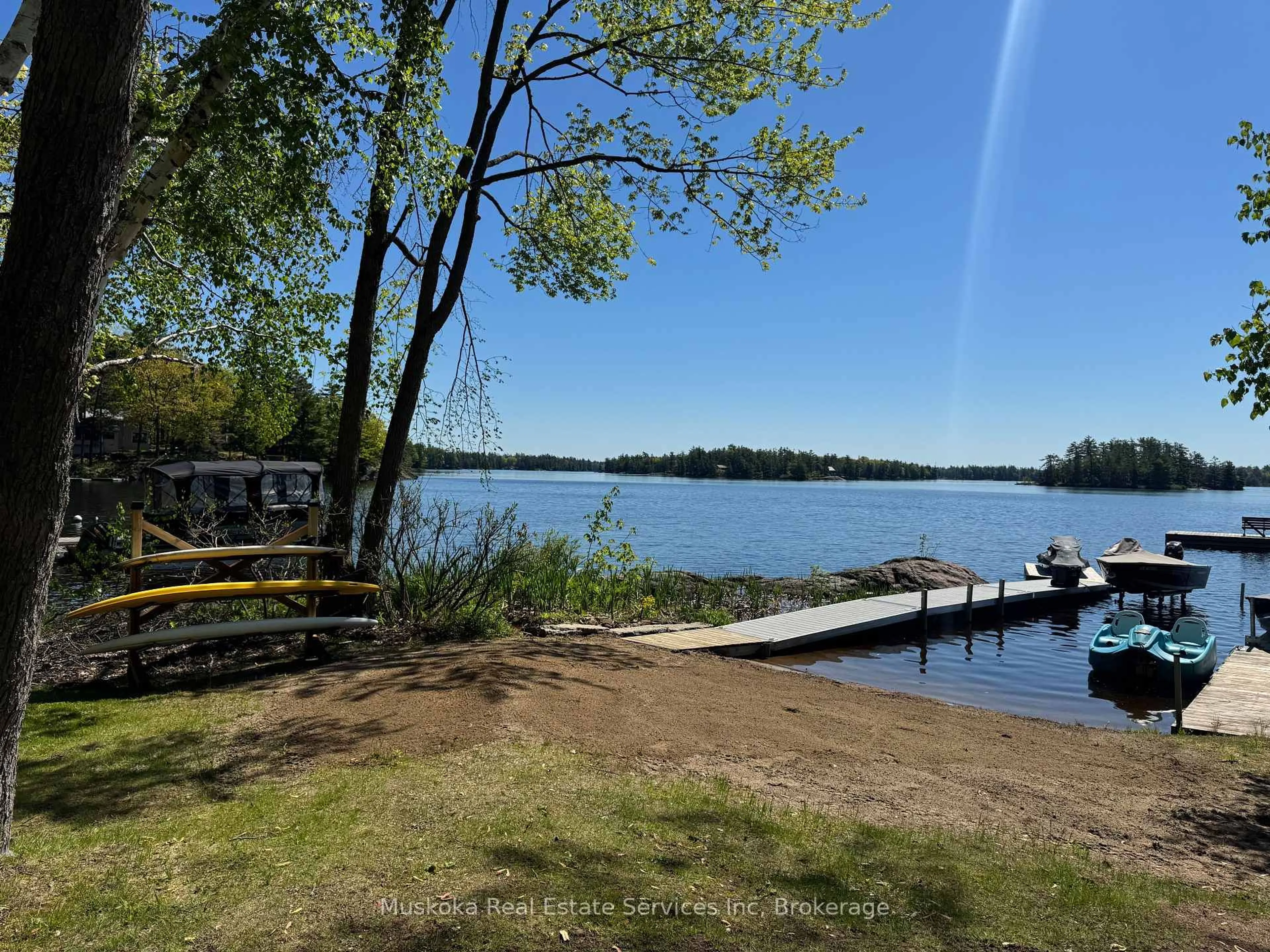 A pic from outside/outdoor area/front of a property/back of a property/a pic from drone, water/lake/river/ocean view for 1188 North Kahshe Lake Rd, Gravenhurst Ontario P0E 1G0