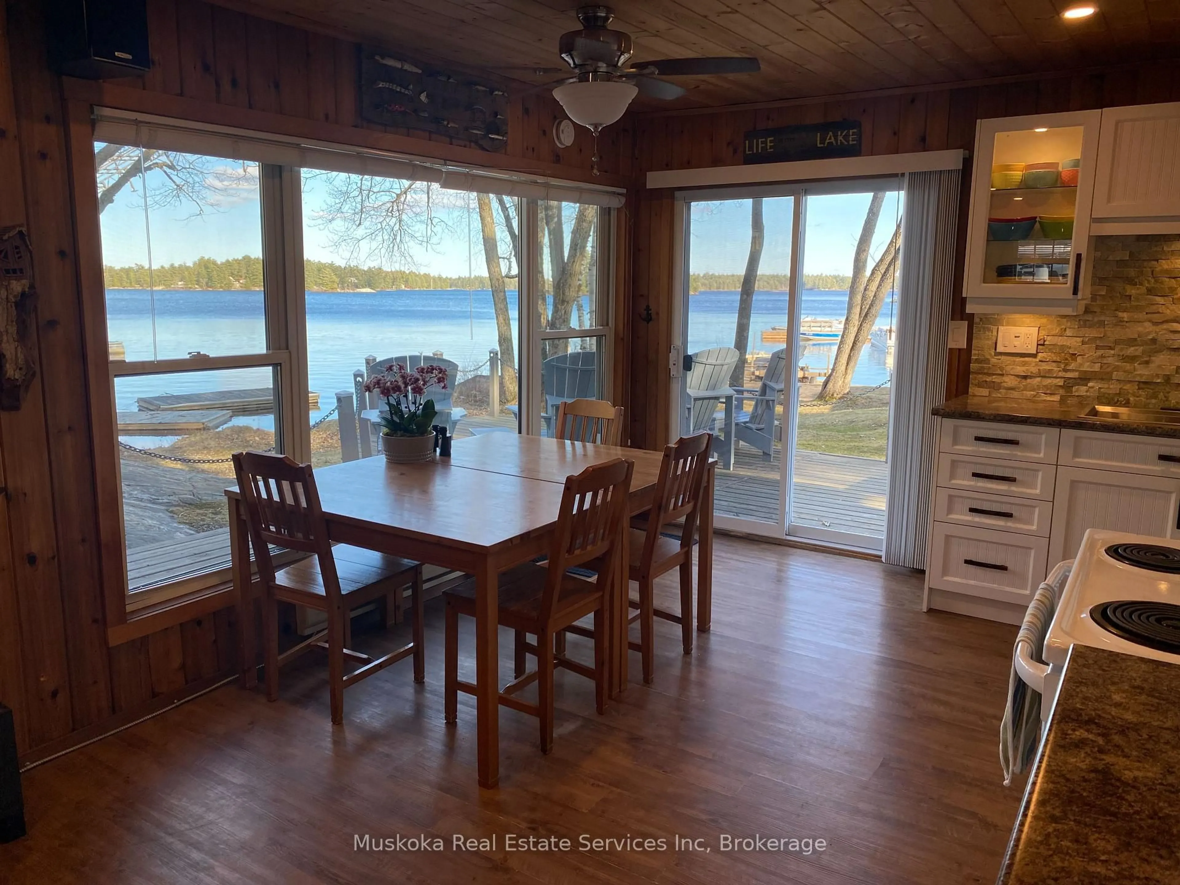 Dining room, wood/laminate floor for 1188 North Kahshe Lake Rd, Gravenhurst Ontario P0E 1G0