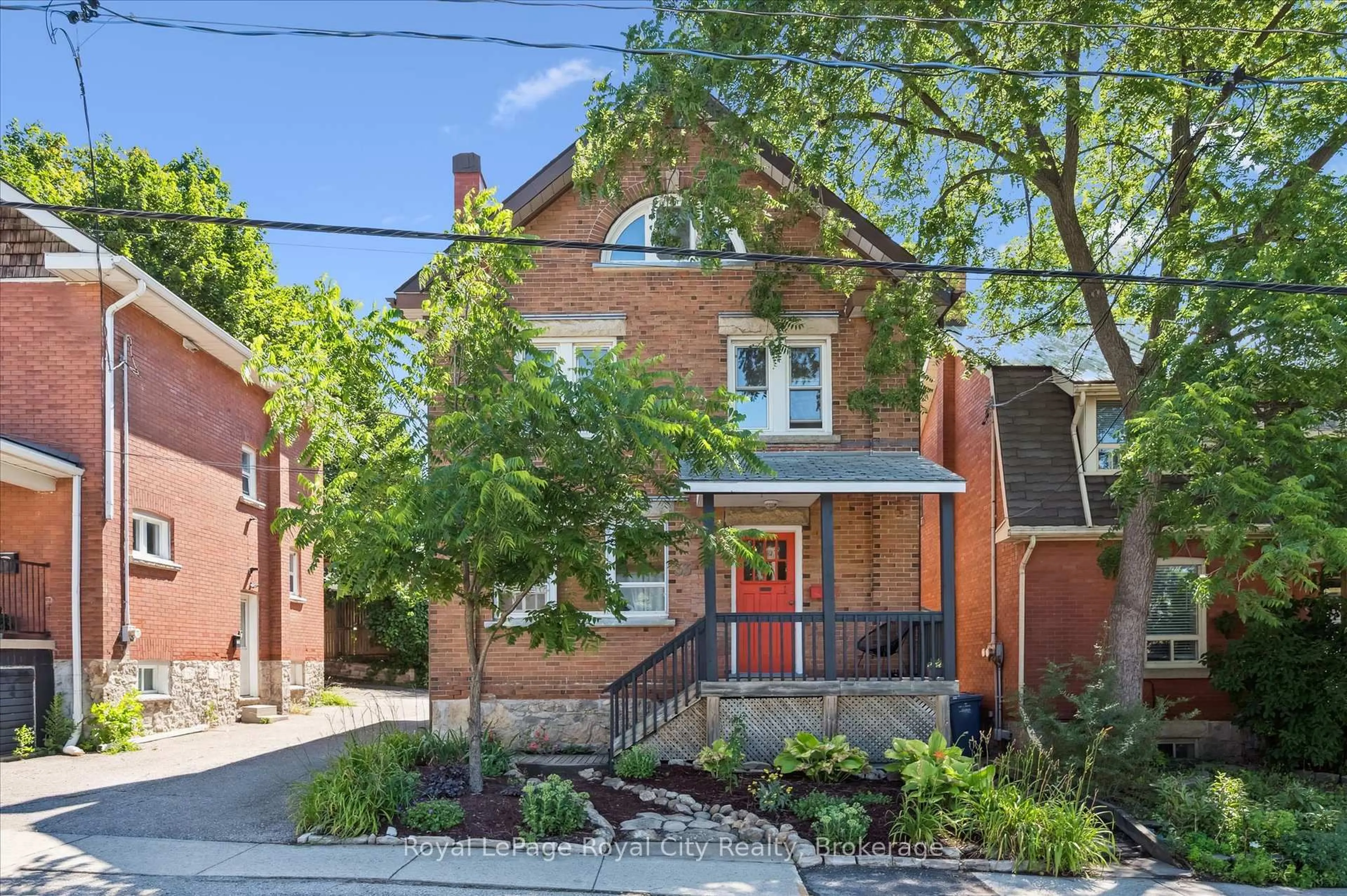 Home with brick exterior material, street for 33 Eramosa Rd, Guelph Ontario N1E 2L4